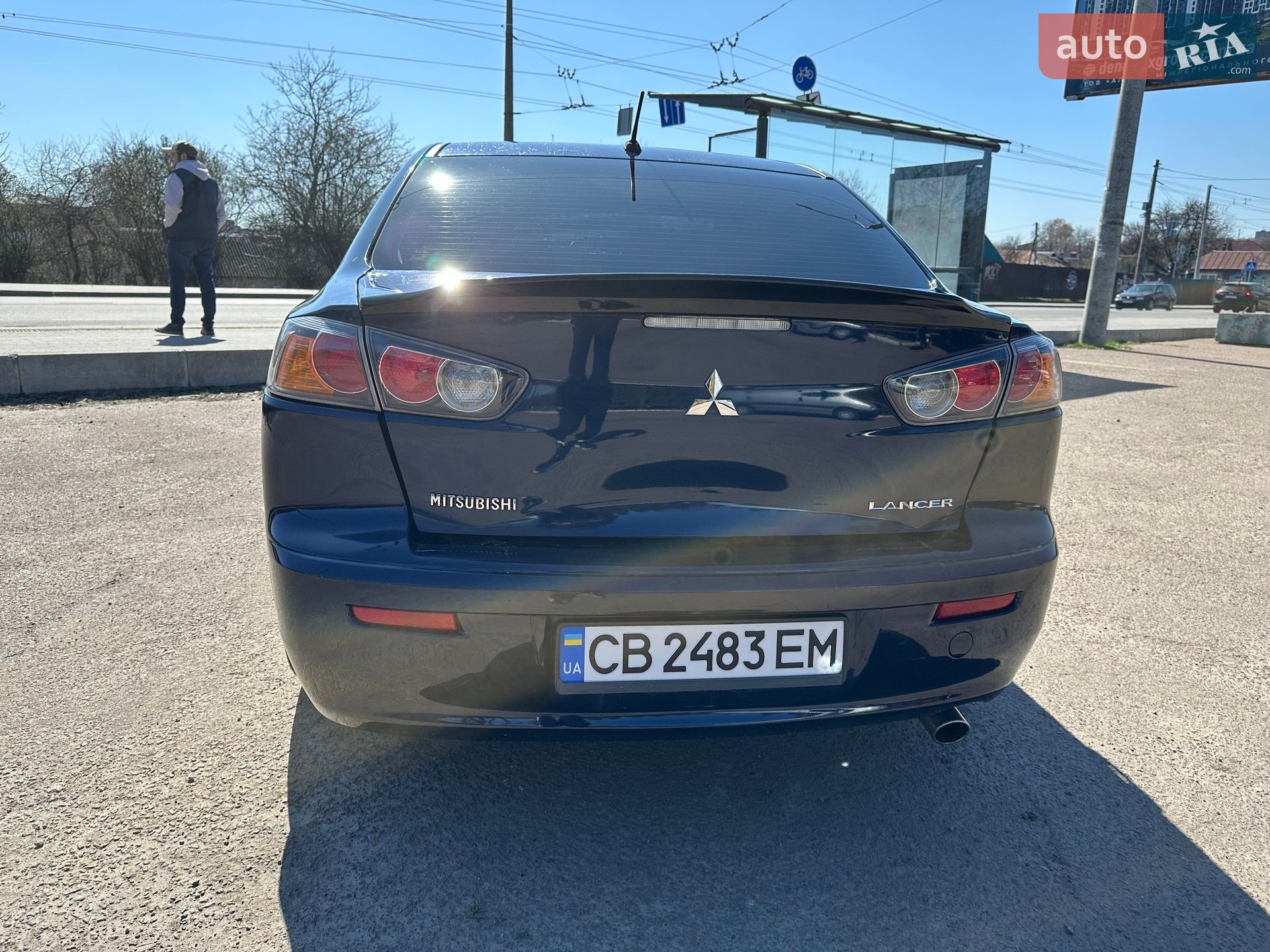 Mitsubishi Lancer 2013 VIN JA32U2FU0DU023794 фото оголошення 8 з 18