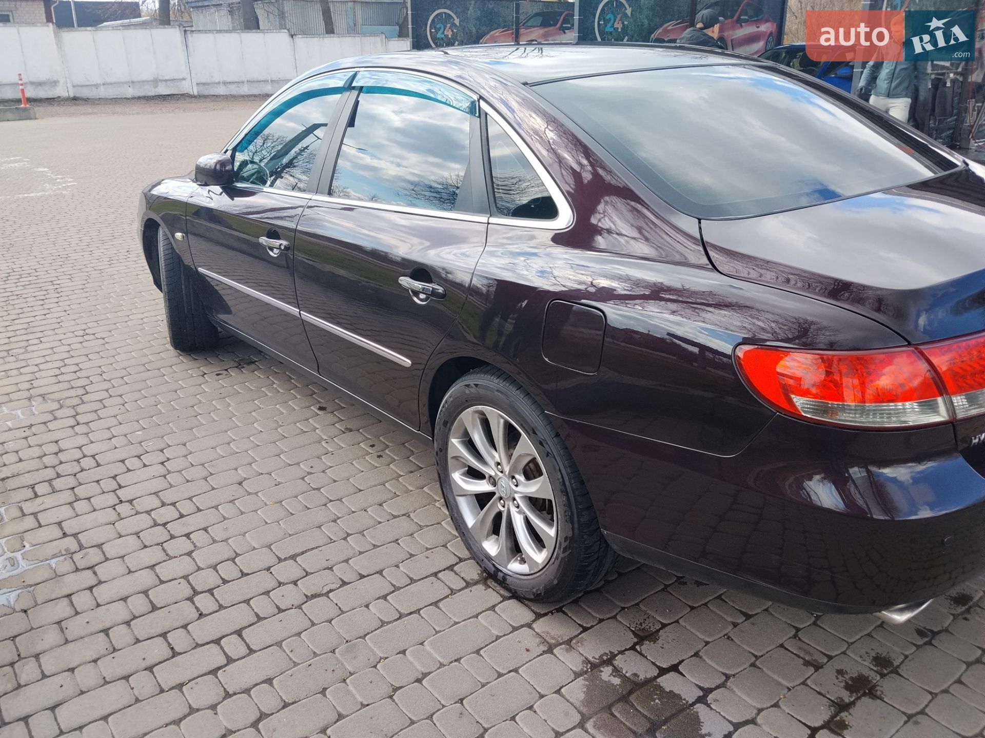 Hyundai Grandeur 2007 VIN KMHFC41DP7A215561 фото оголошення 2 з 11