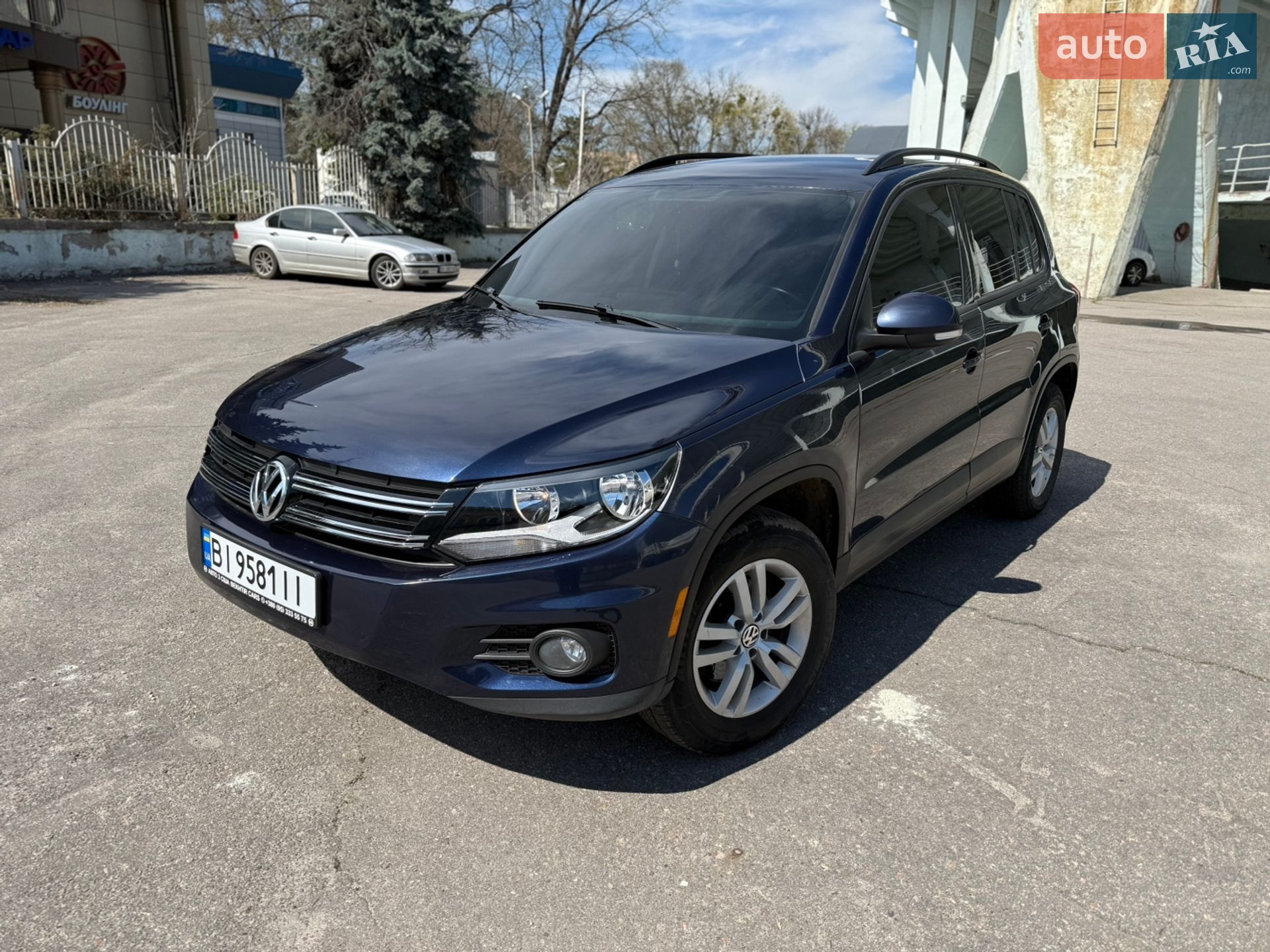 Volkswagen Tiguan 2014 VIN WVGJV3AX5EW578596 фото оголошення 2 з 26