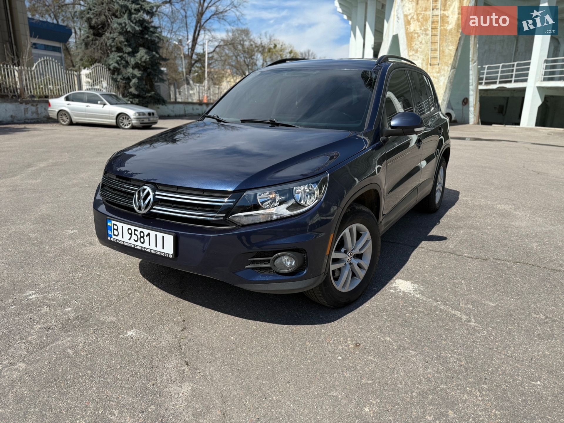 Volkswagen Tiguan 2014 VIN WVGJV3AX5EW578596 фото оголошення 3 з 26