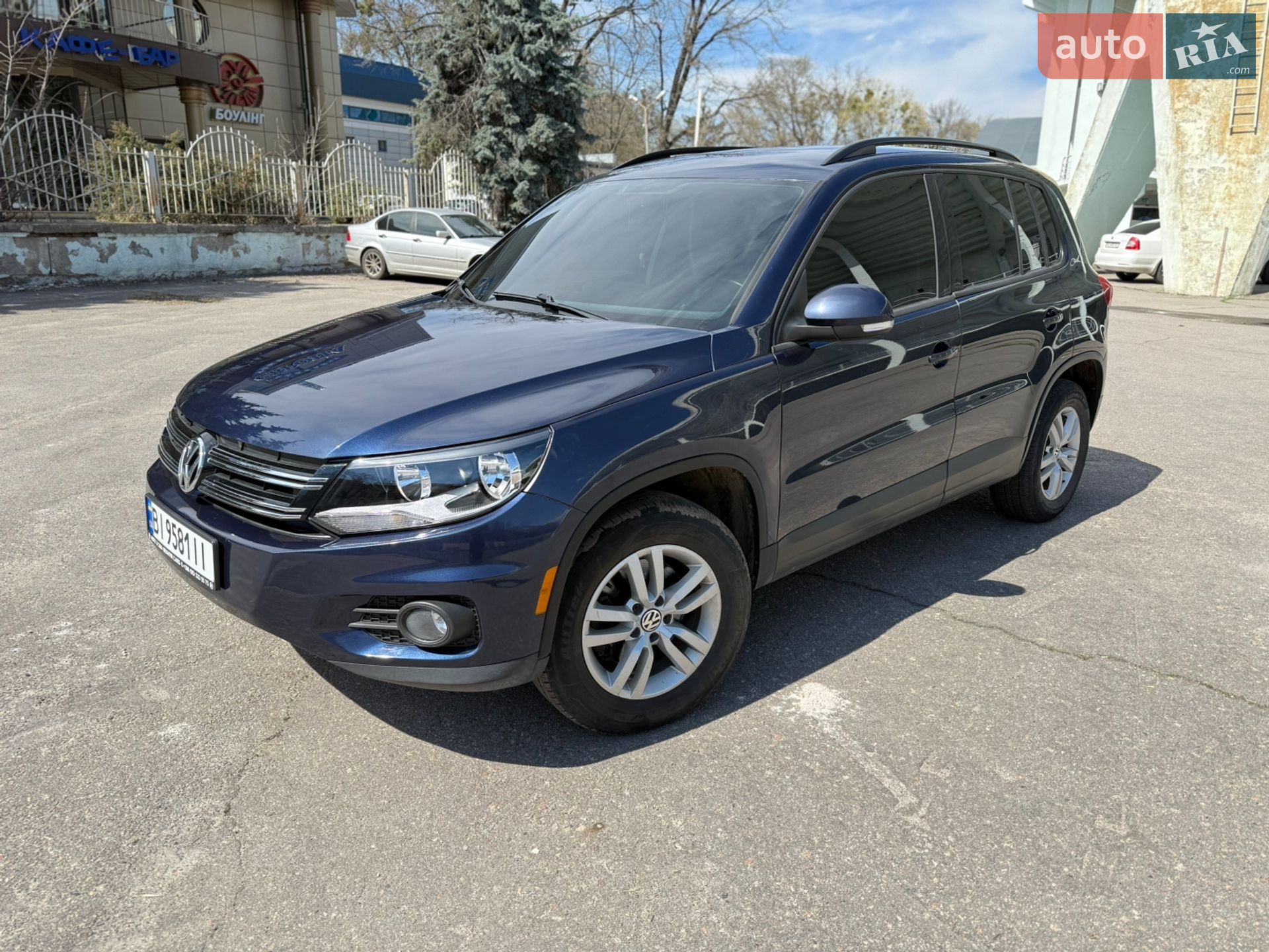 Volkswagen Tiguan 2014 VIN WVGJV3AX5EW578596 фото оголошення 4 з 26