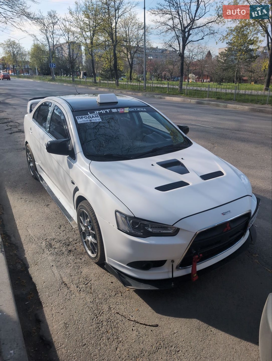 Mitsubishi Lancer 2013 VIN JA32V6FV1EU004945 фото оголошення 6 з 8
