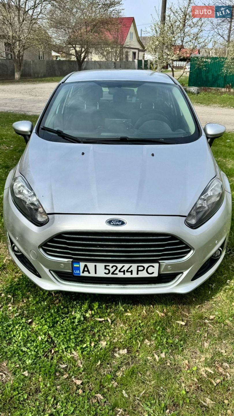 Ford Fiesta 2017 VIN 3FADP4BJ3HM126250 фото оголошення 2 з 13