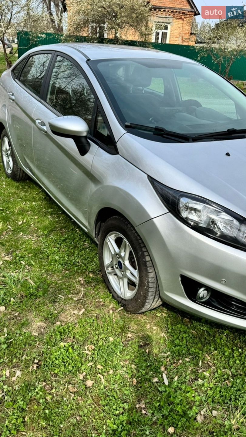 Ford Fiesta 2017 VIN 3FADP4BJ3HM126250 фото оголошення 7 з 13