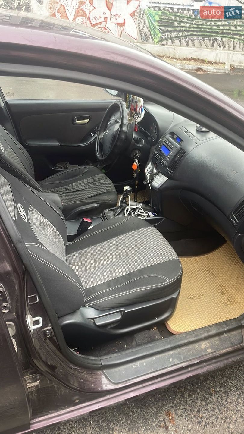 Hyundai Elantra 2011 VIN KMHDU41BABU228631 фото оголошення 4 з 5