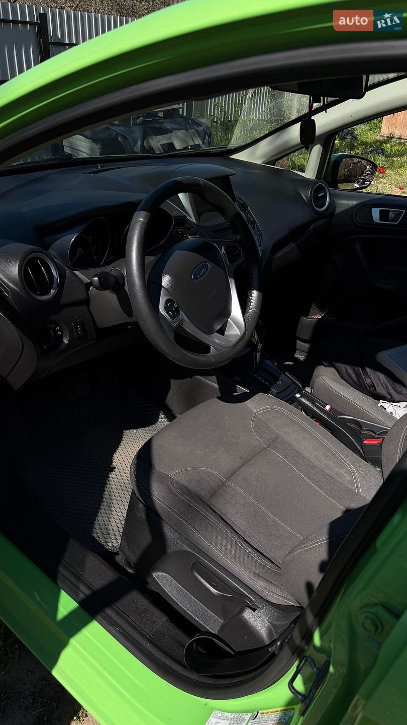 Ford Fiesta 2014 VIN 3FADP4BJ9FM110499 фото оголошення 9 з 13