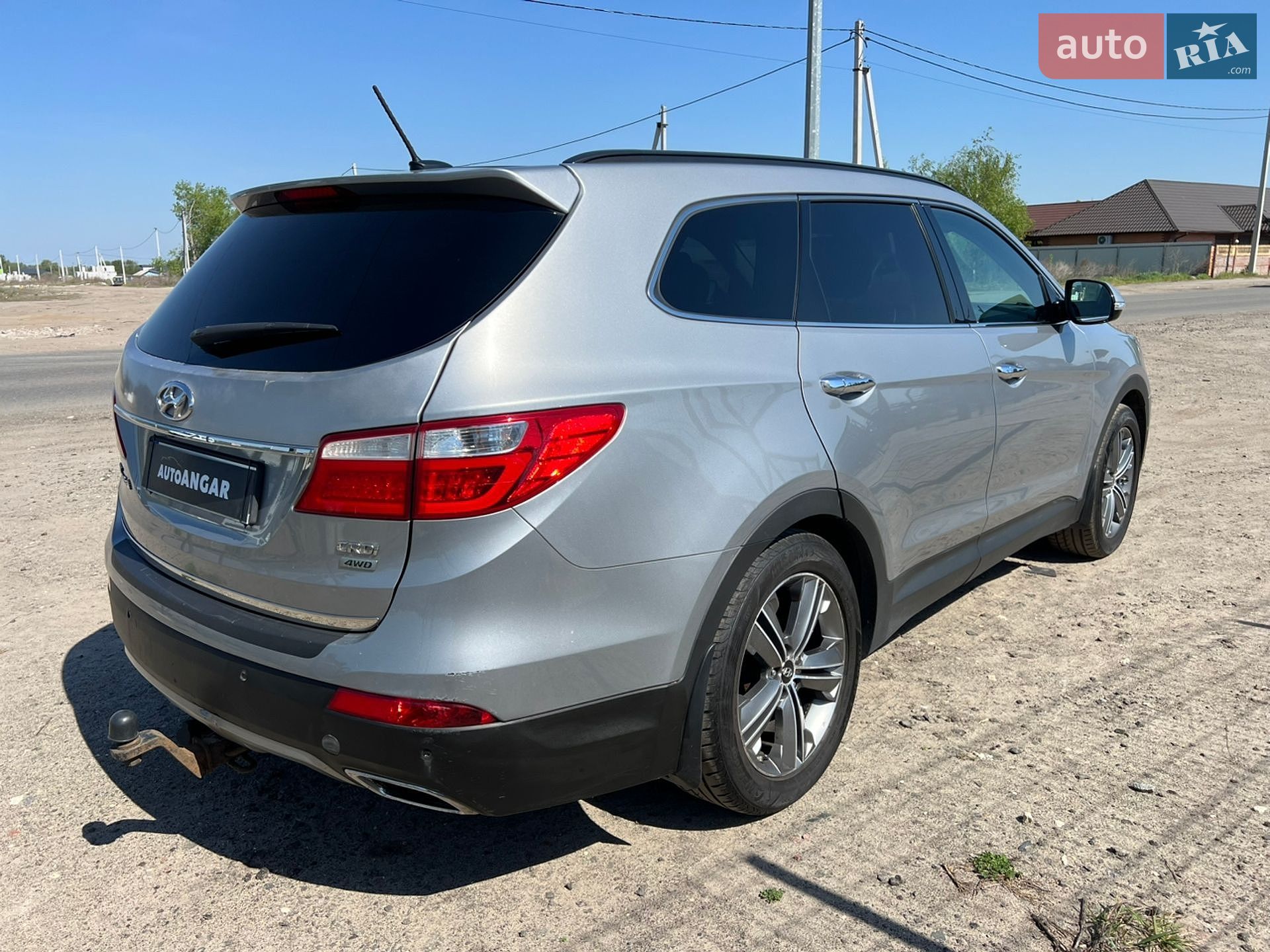 Hyundai Grand Santa Fe 2015 VIN KMHSN81XDFU109517 фото оголошення 5 з 23