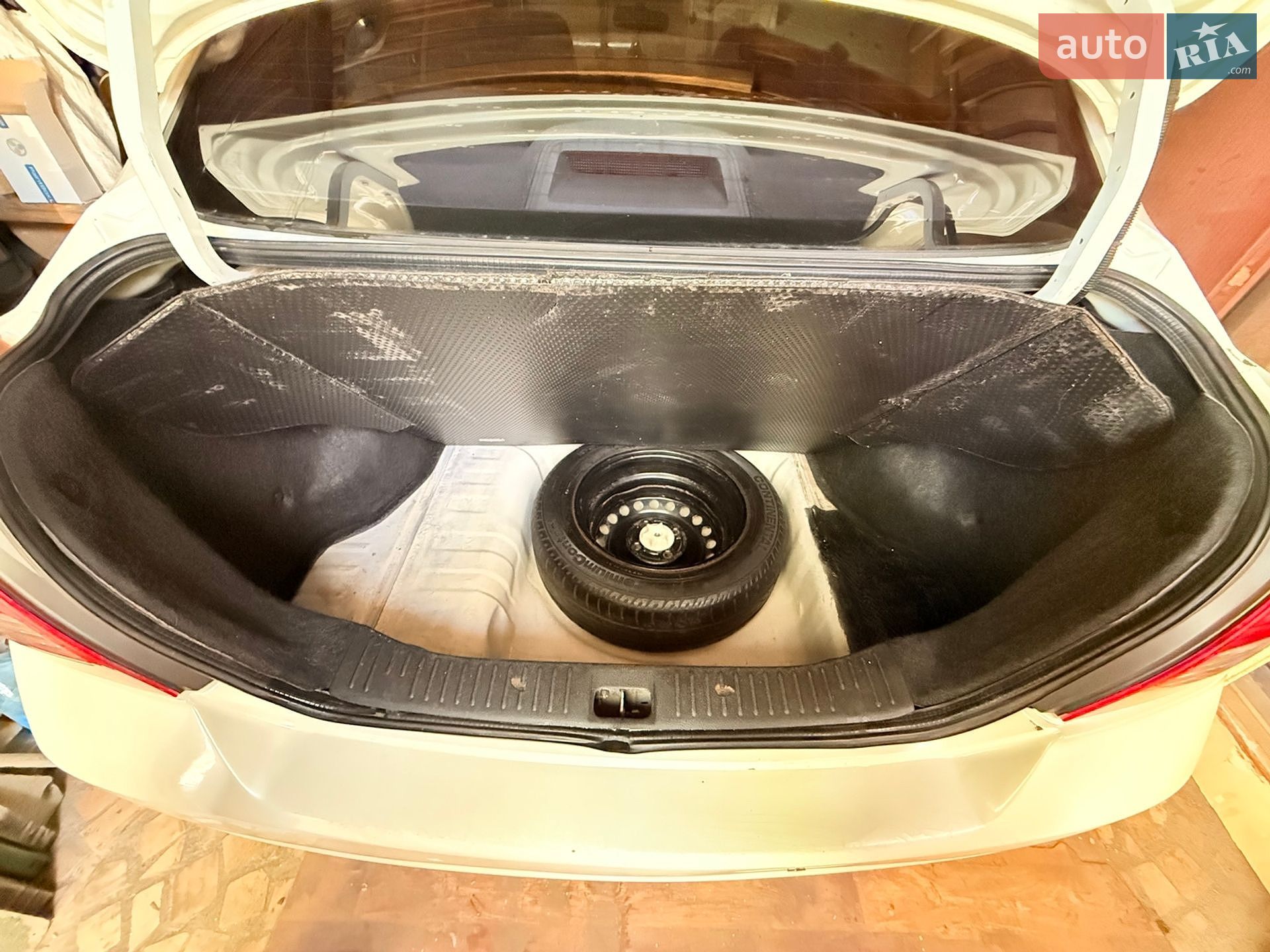 Nissan TIIDA 2009 VIN JN1CC11CX8T018814 фото оголошення 21 з 23