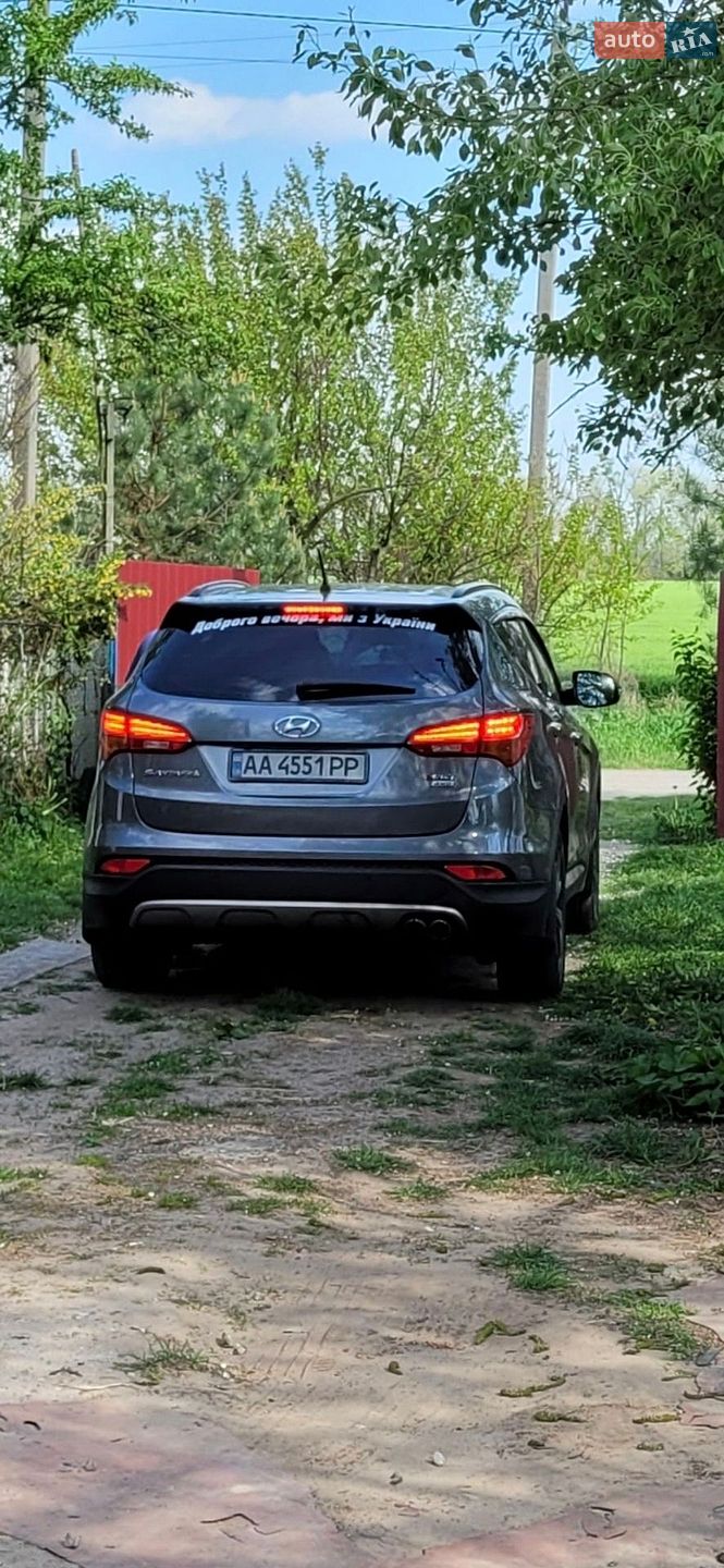 Hyundai Santa FE 2014 VIN KMHSW81UDFU419976 фото оголошення 4 з 31