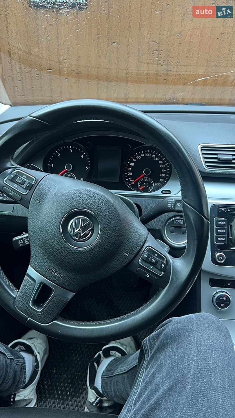 Volkswagen Passat 2014 VIN WVWZZZ3CZEE170216 фото оголошення 2 з 7