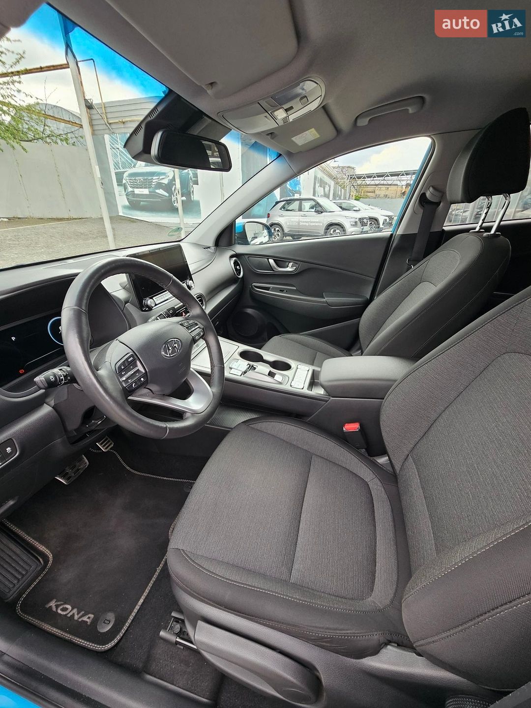 Hyundai Kona Electric 2021 VIN TMAK381HFMJ032604 фото оголошення 12 з 25