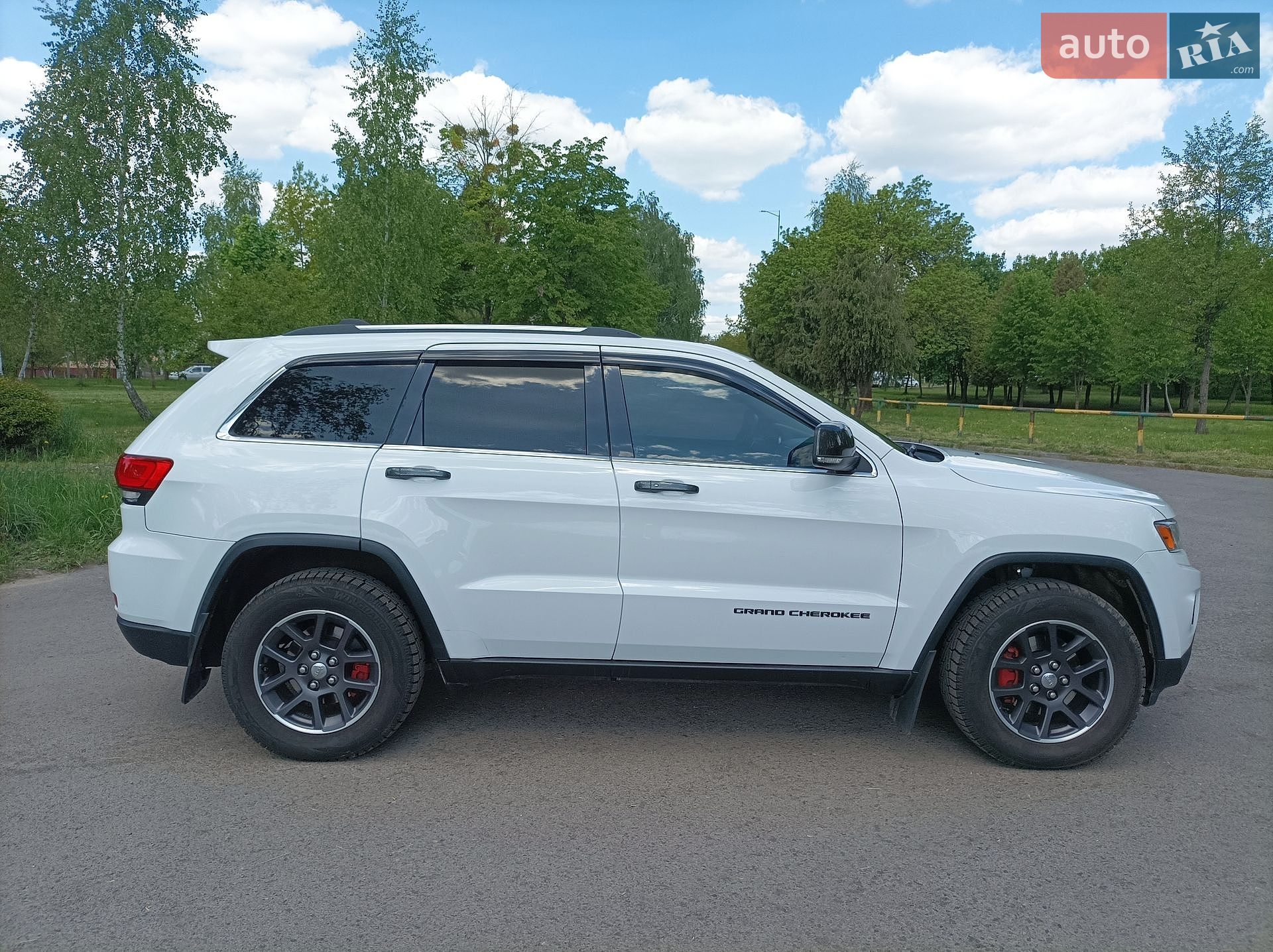 Jeep Grand Cherokee 2013 VIN 1C4RJEBM2EC317169 фото оголошення 4 з 30