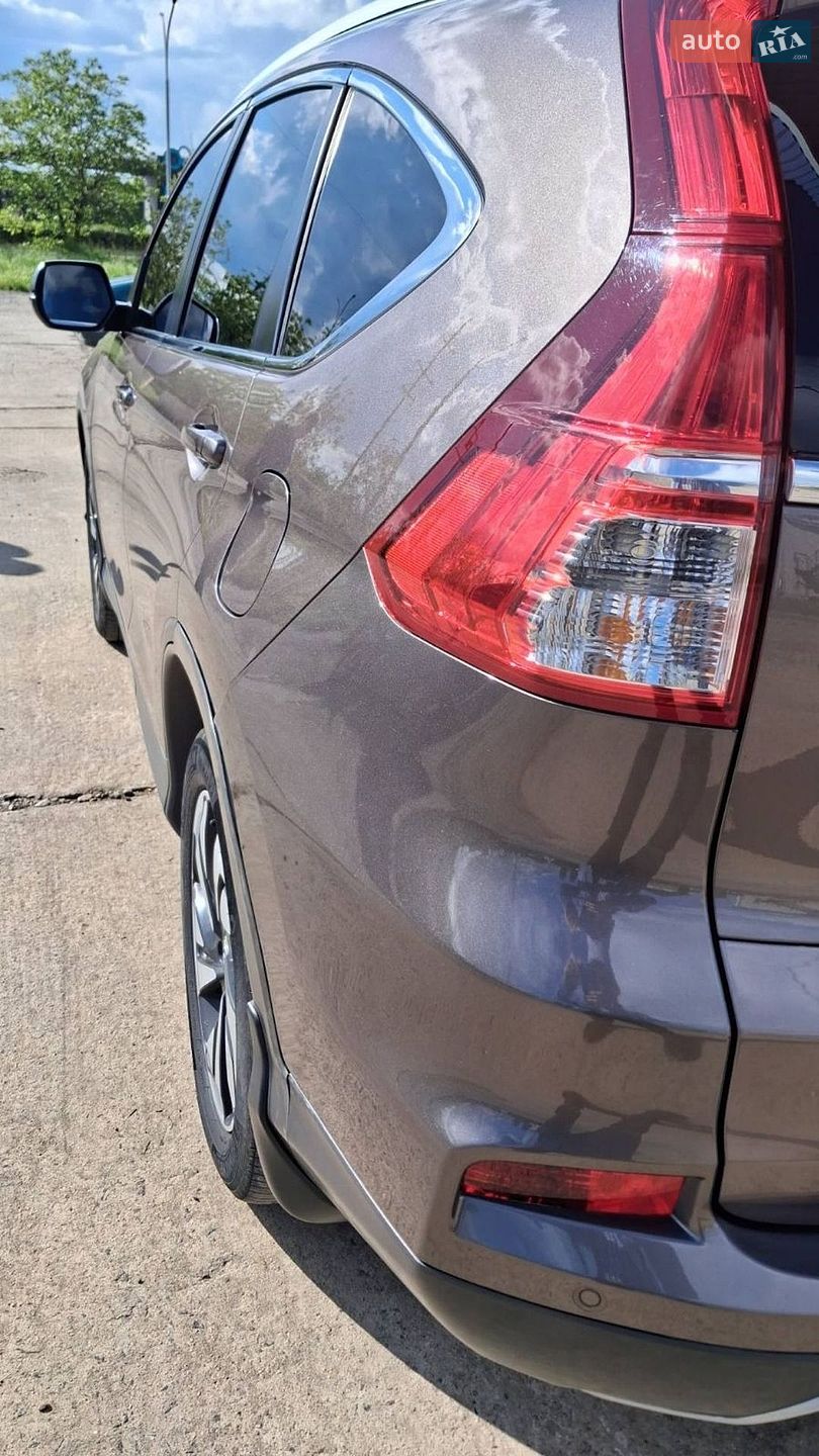 Honda CR-V 2017 VIN SHSRE6790GU005872 фото оголошення 16 з 17