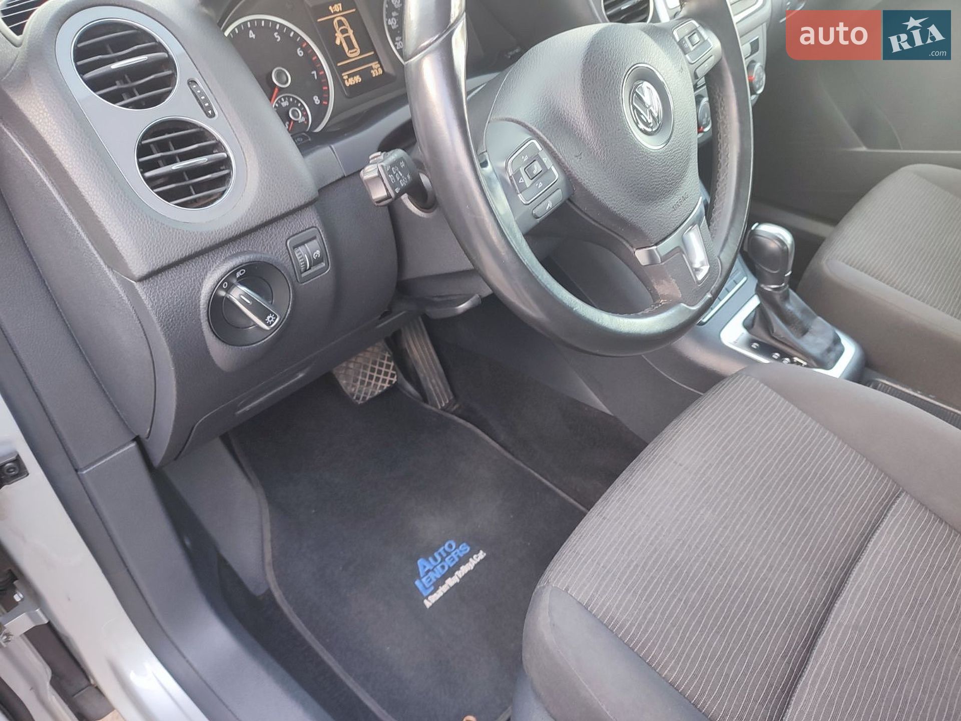 Volkswagen Tiguan 2013 VIN WVGBV3AX7EW545782 фото оголошення 9 з 27