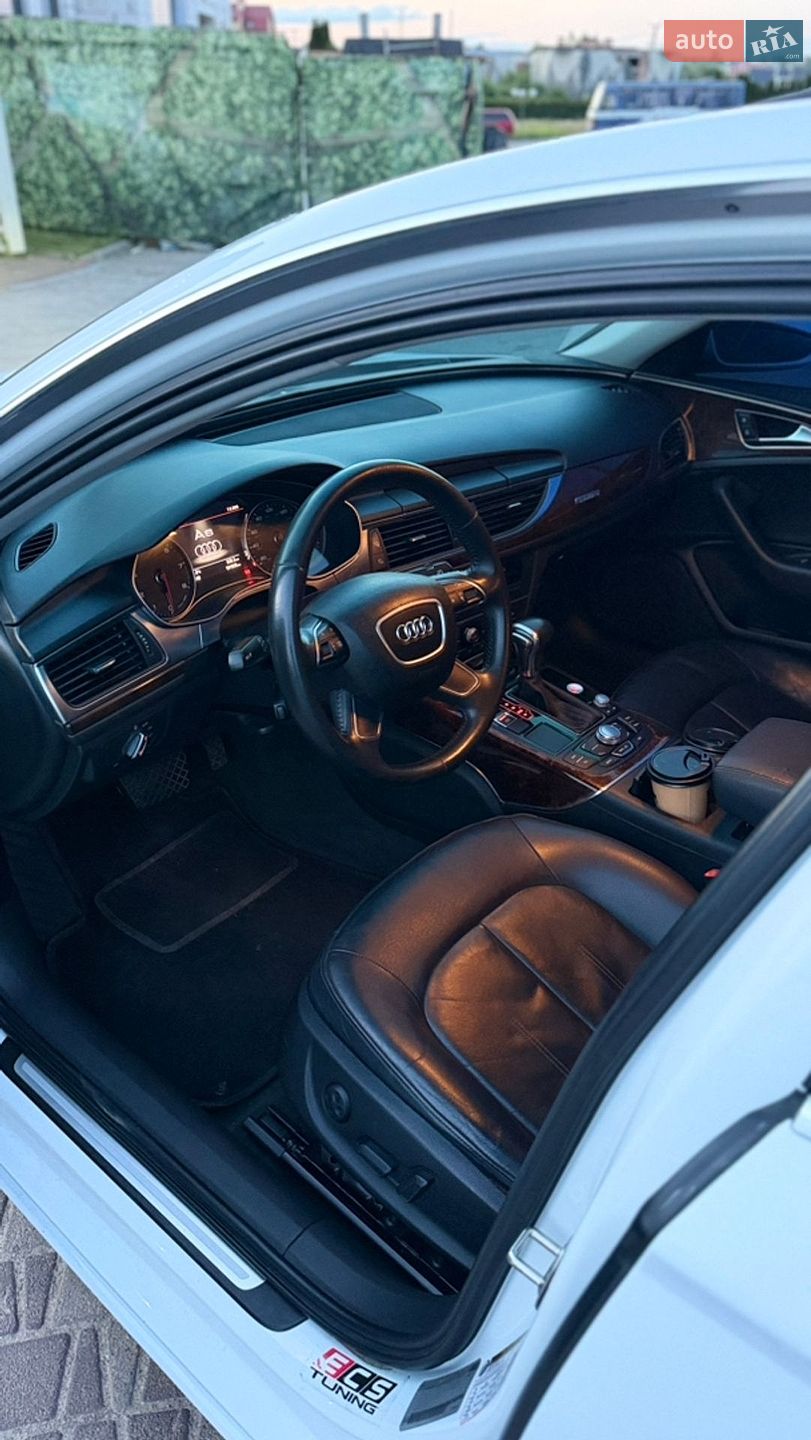 Audi A6 2012 VIN WAUGFAFC2DN064728 фото оголошення 9 з 14