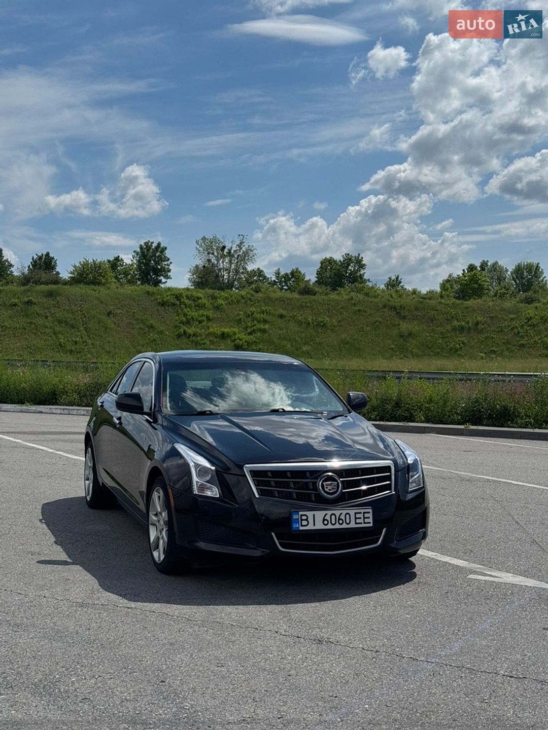 Cadillac ATS 2014 VIN 1G6AG5RX1E0179379 фото оголошення 2 з 18