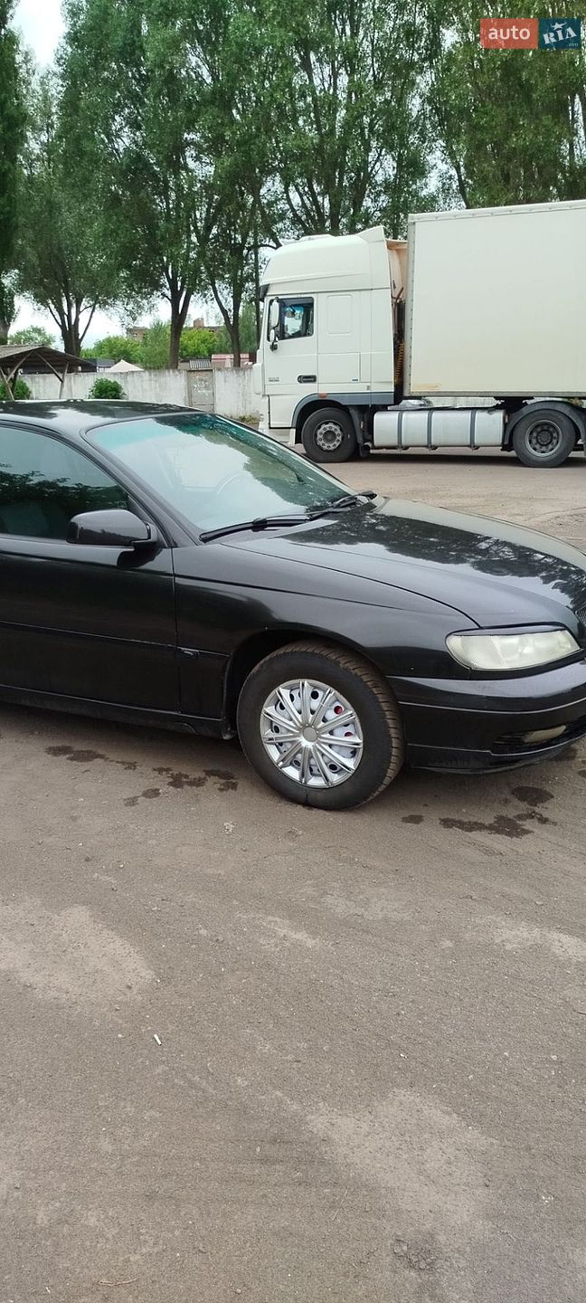 Opel Omega 2000 VIN W0L0VBM6911073783 фото оголошення 10 з 32