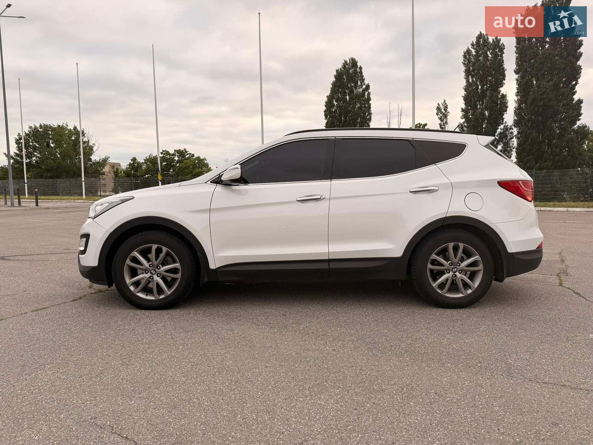 Hyundai Santa FE 2013 VIN KMHST81CBEU157003 фото оголошення 18 з 19