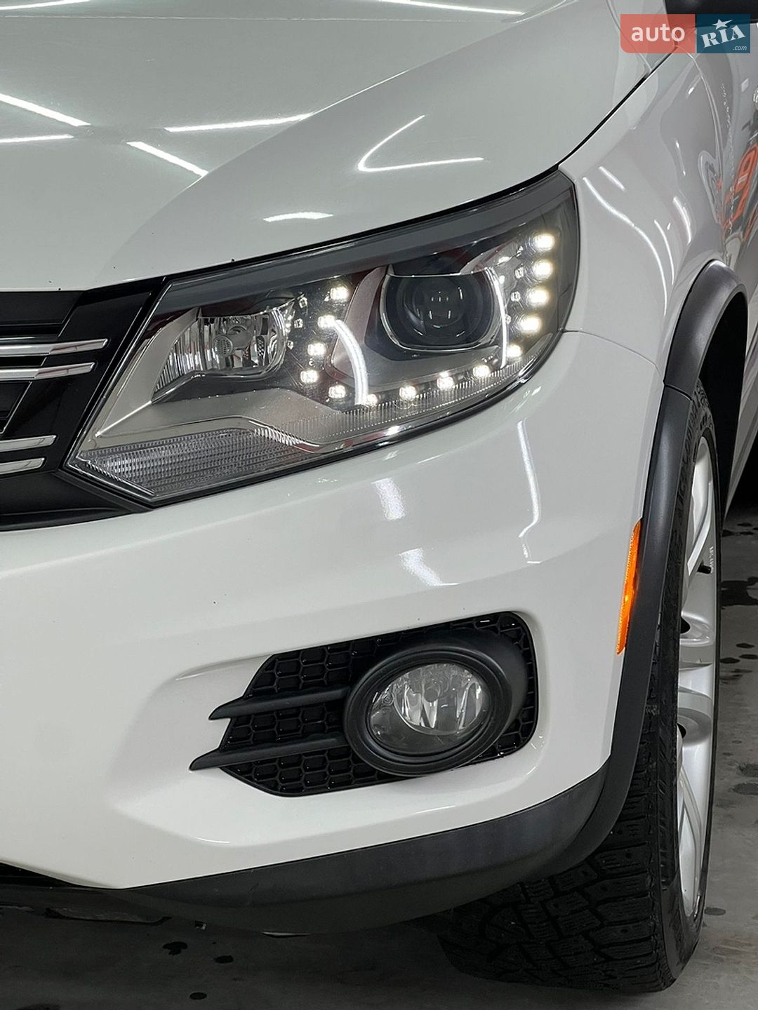 Volkswagen Tiguan 2013 VIN WVGBV3AXXDW583912 фото оголошення 16 з 25