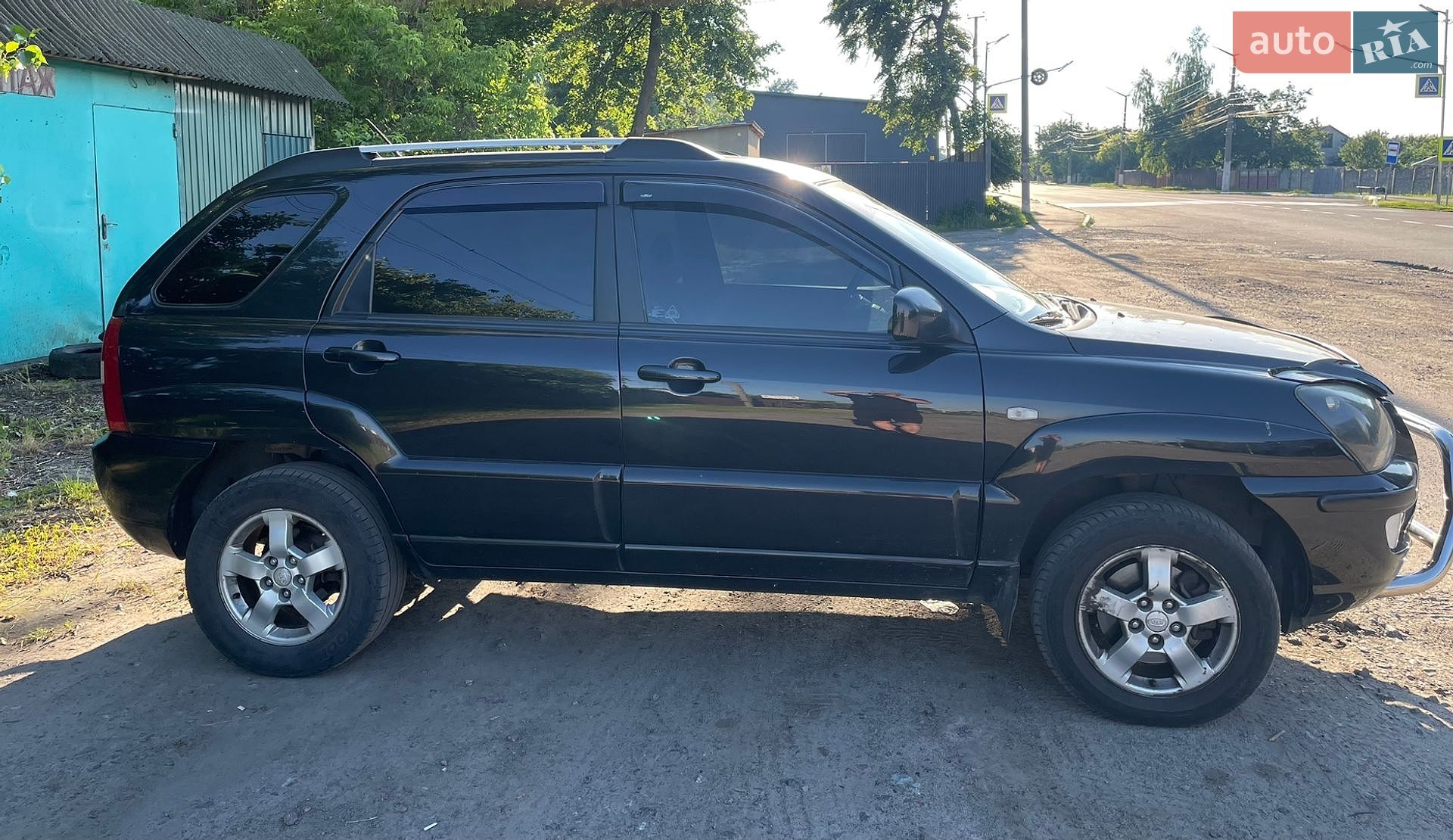 Kia Sportage 2009 VIN U6YJE55528L024495 фото оголошення 2 з 12