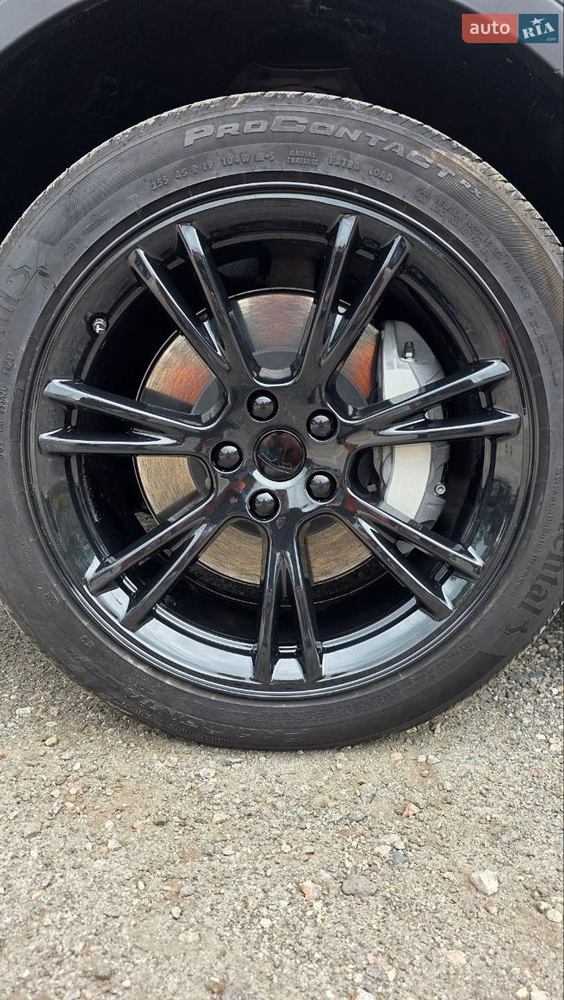 Tesla Model Y 2024 VIN 7SAYGDEE1RF123687 фото оголошення 5 з 12