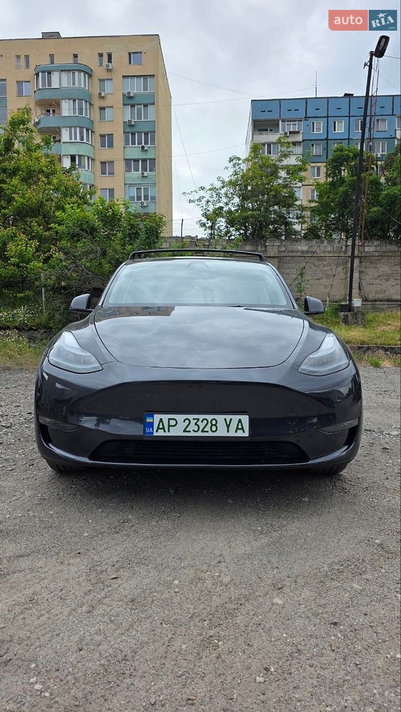 Tesla Model Y 2024 VIN 7SAYGDEE1RF123687 фото оголошення 2 з 12