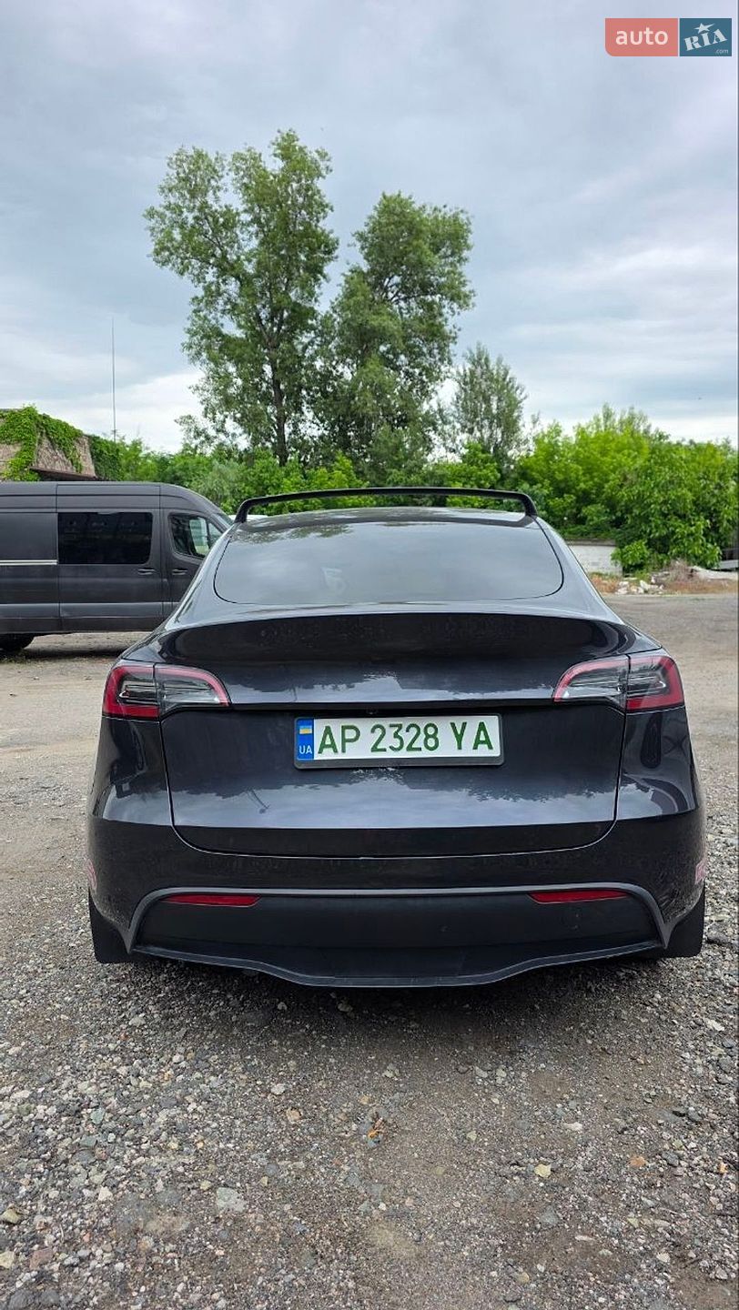 Tesla Model Y 2024 VIN 7SAYGDEE1RF123687 фото оголошення 4 з 12