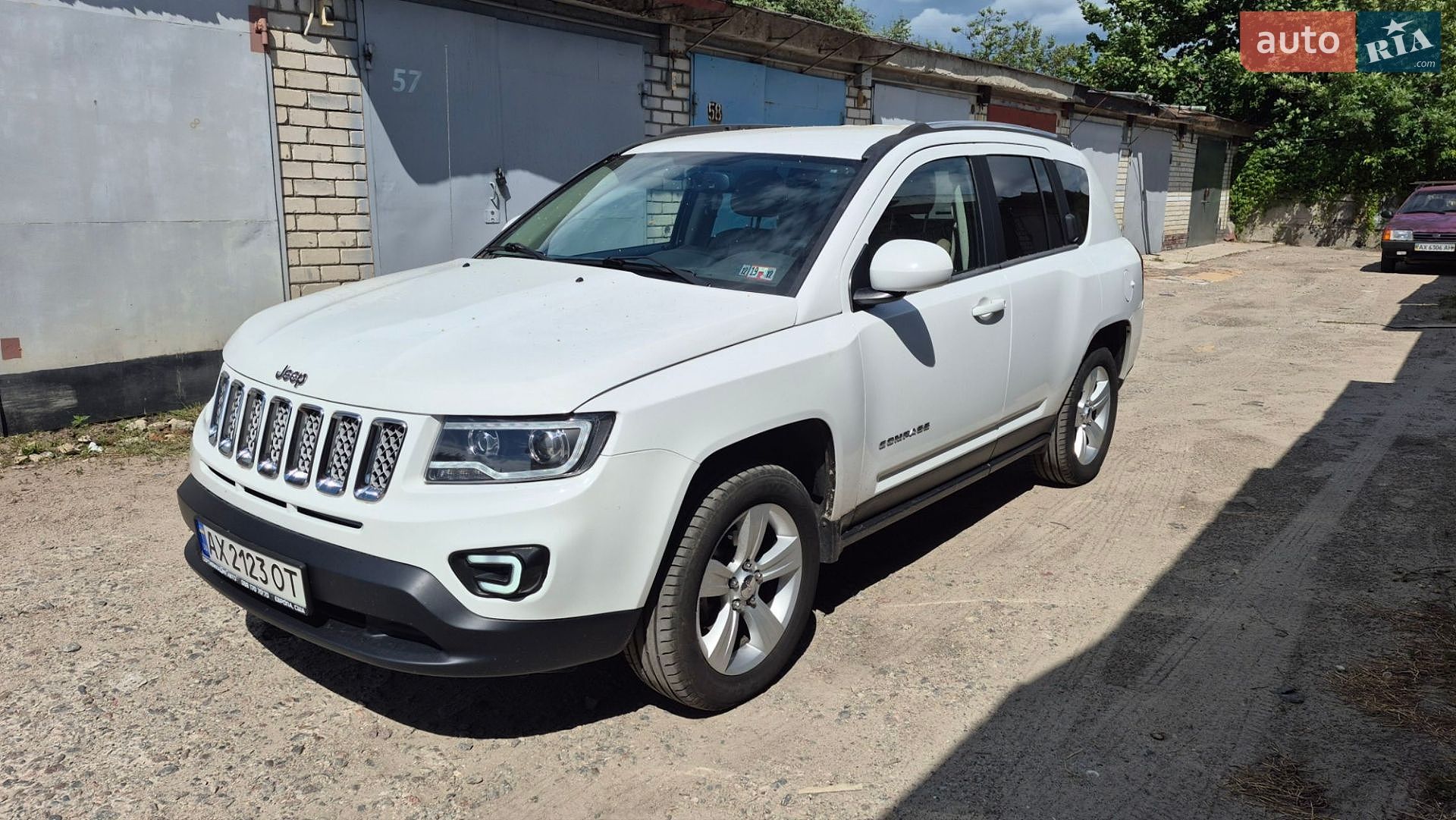 Jeep Compass 2013 VIN 1C4NJDEB7ED500970 фото оголошення 2 з 14
