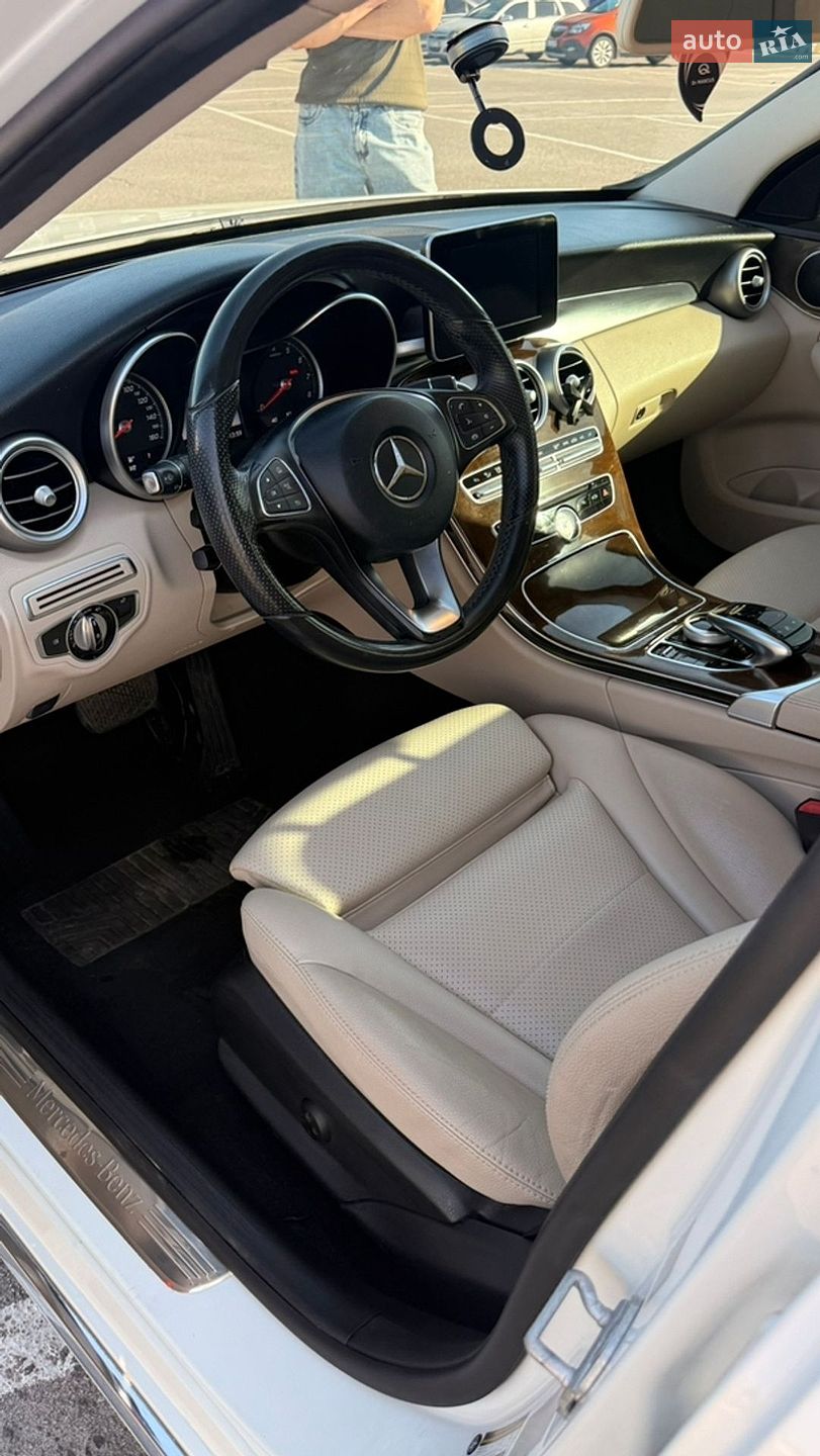 Mercedes-Benz C-Class 2015 VIN WDDWF4KB2GR135801 фото оголошення 14 з 16