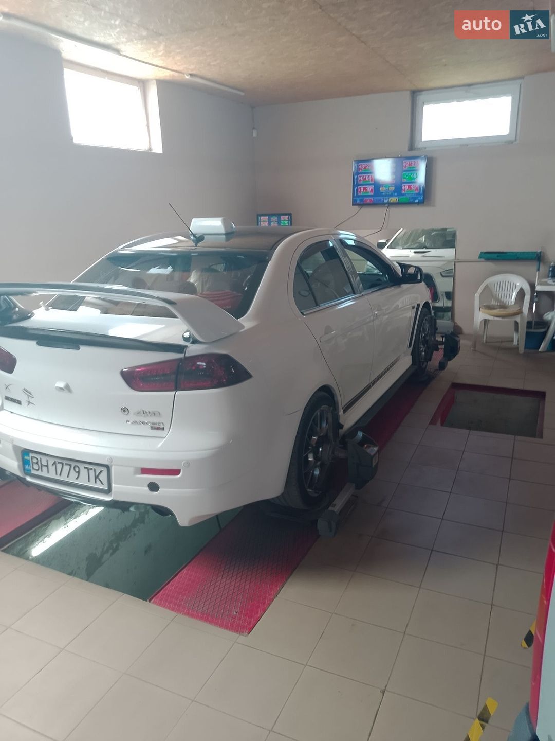 Mitsubishi Lancer 2013 VIN JA32V6FV1EU004945 фото оголошення 7 з 20