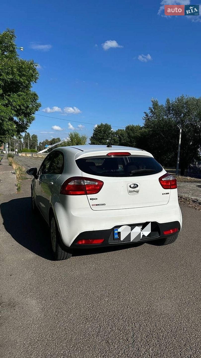 Kia Rio 2014 VIN KNADN5A32E6954677 фото оголошення 4 з 14