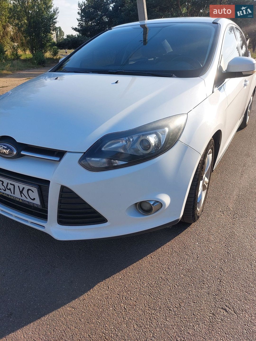 Ford Focus 2012 VIN WF0MXXGCBMCL44214 фото оголошення 13 з 15