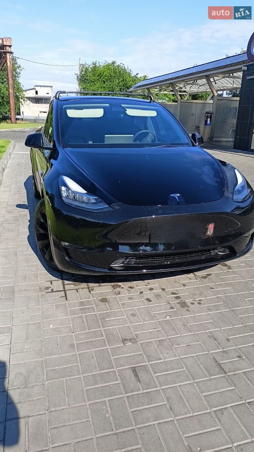 Tesla Model Y 2022 VIN 7SAYGAEE0NF391283 фото оголошення 2 з 9