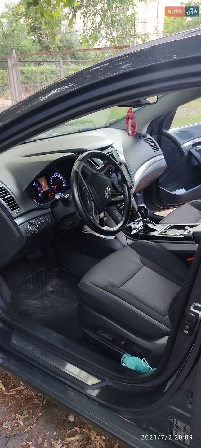 Hyundai i40 2011 VIN KMHLC81UBCU014012 фото оголошення 2 з 9