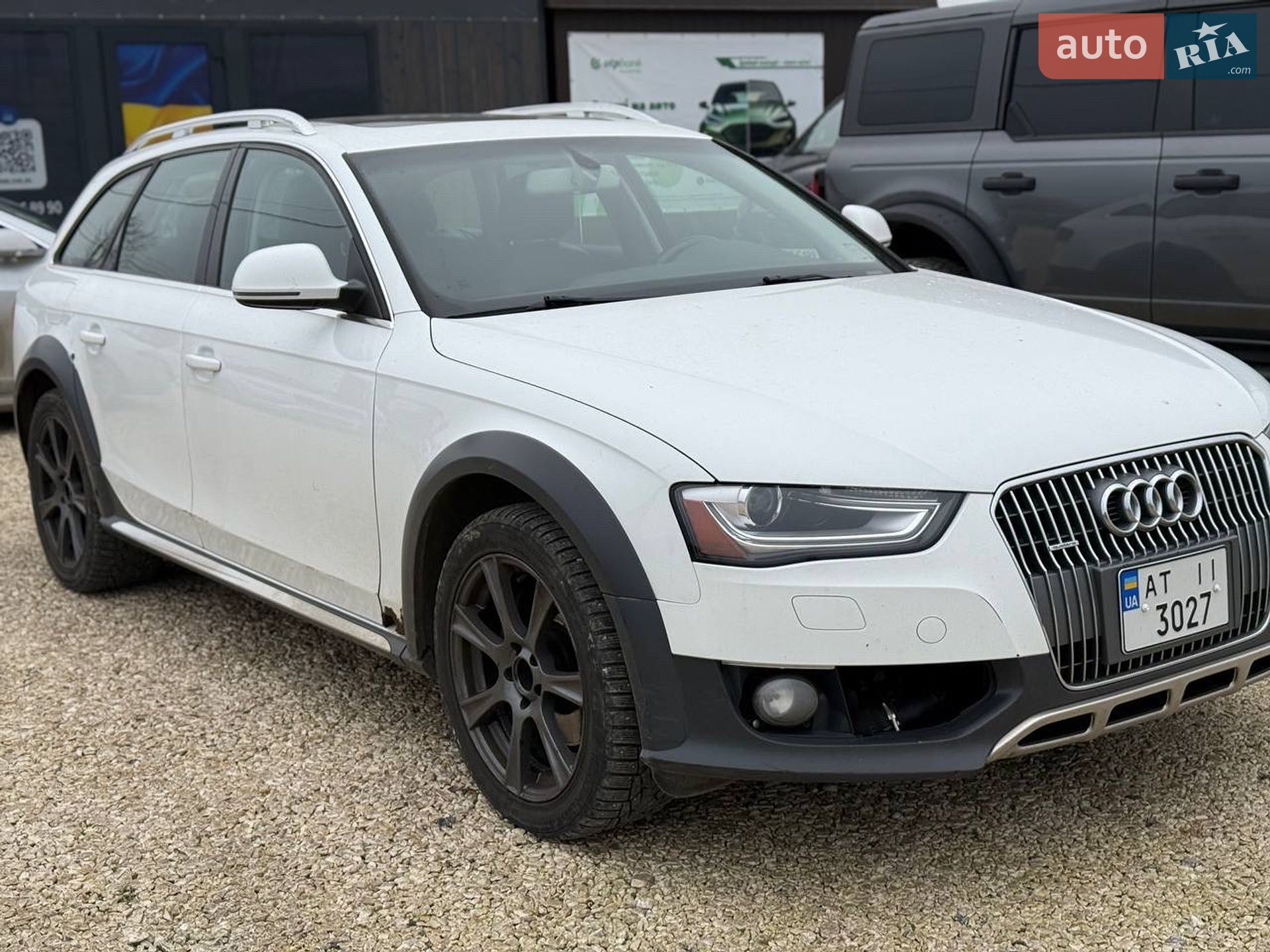 Audi A4 Allroad 2013 VIN WA1TFAFL7EA057455 фото оголошення 2 з 11