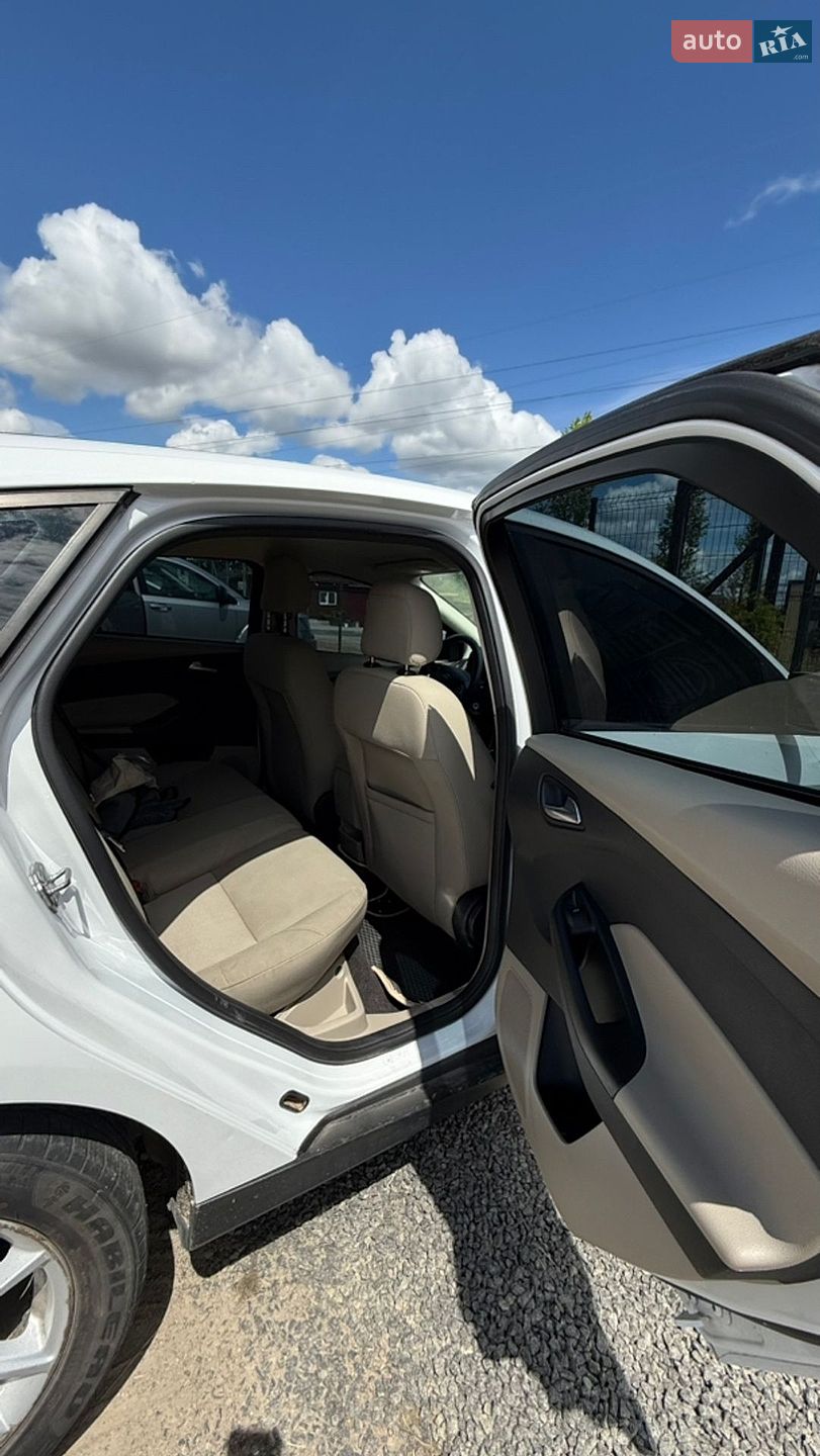 Ford Focus 2017 VIN 1FADP3K2XJL241891 фото оголошення 12 з 14