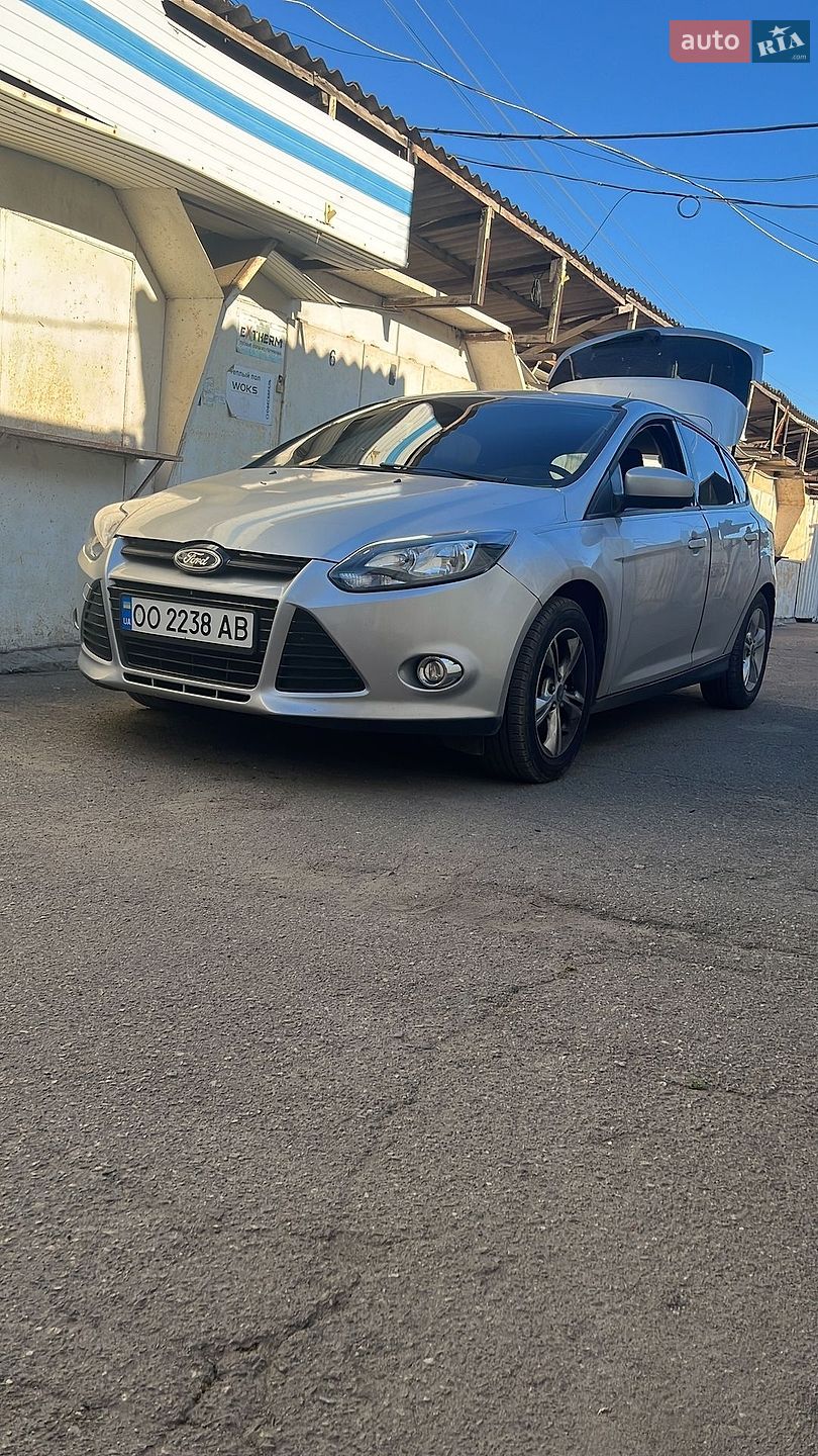 Ford Focus 2011 VIN 1FAHP3K25CL282630 фото оголошення 13 з 14