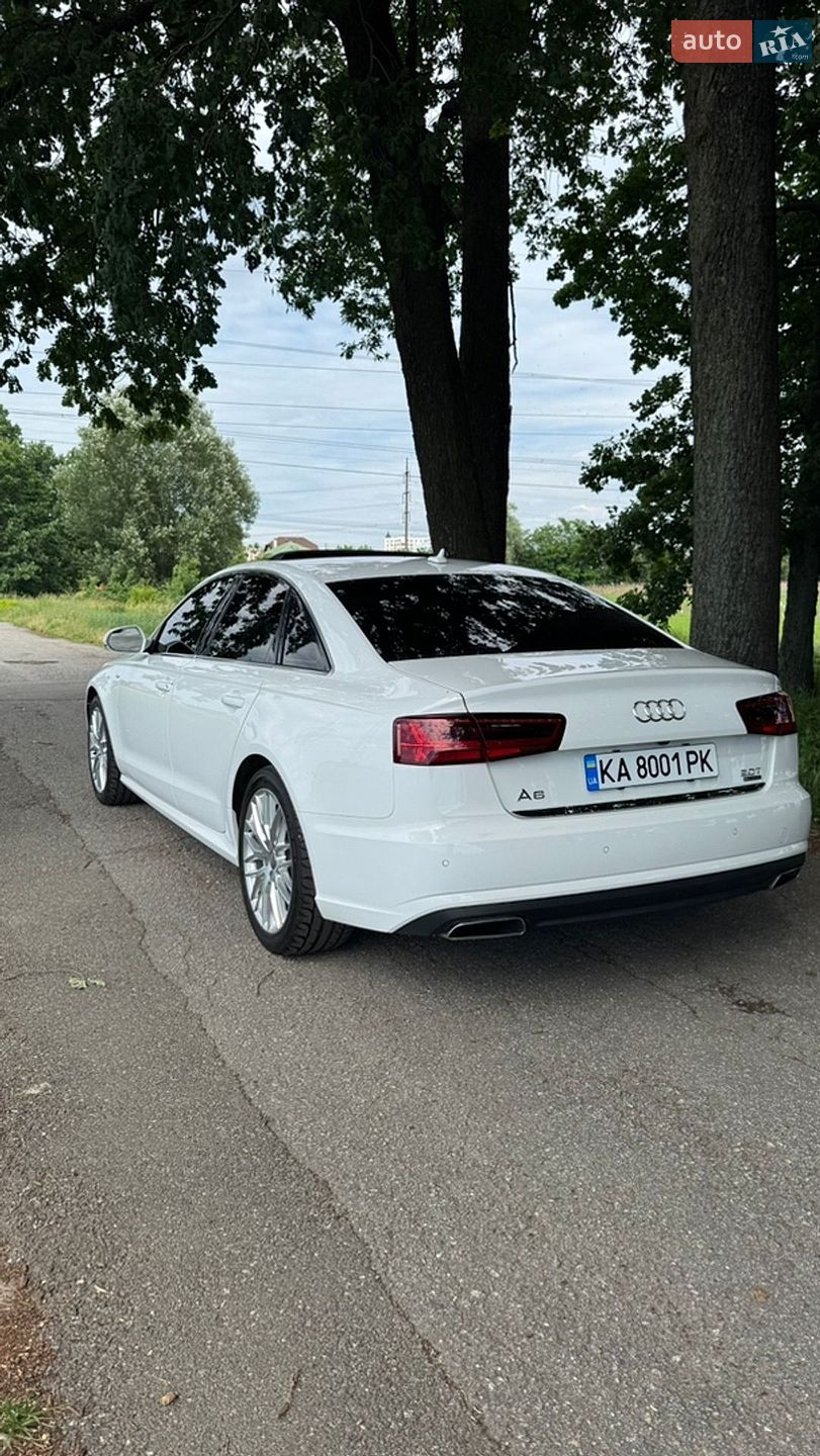Audi A6 2015 VIN WAUFFAFC0GN118737 фото оголошення 2 з 16