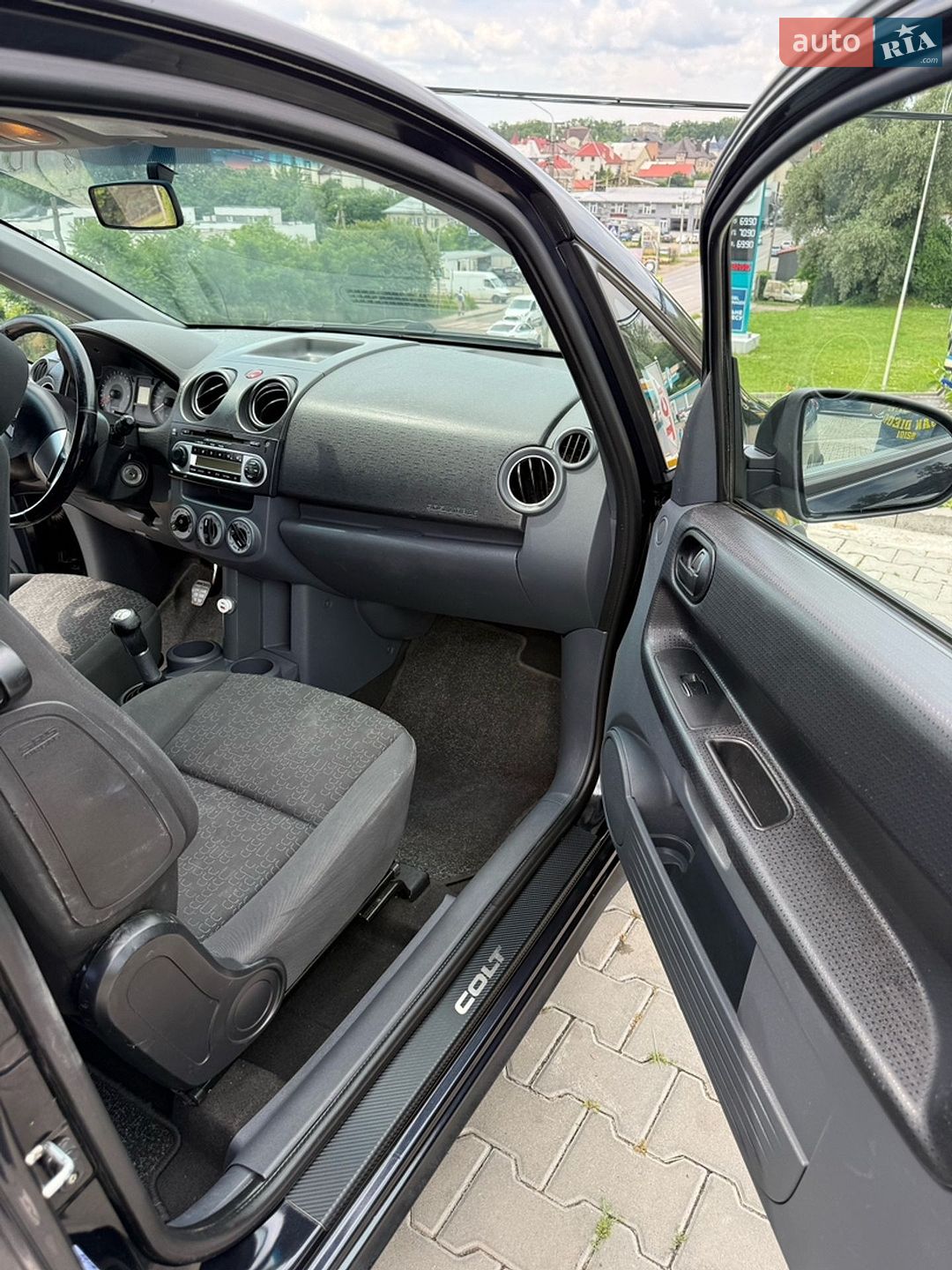 Mitsubishi Colt 2010 VIN XMCMNZ33ABF002074 фото оголошення 11 з 12