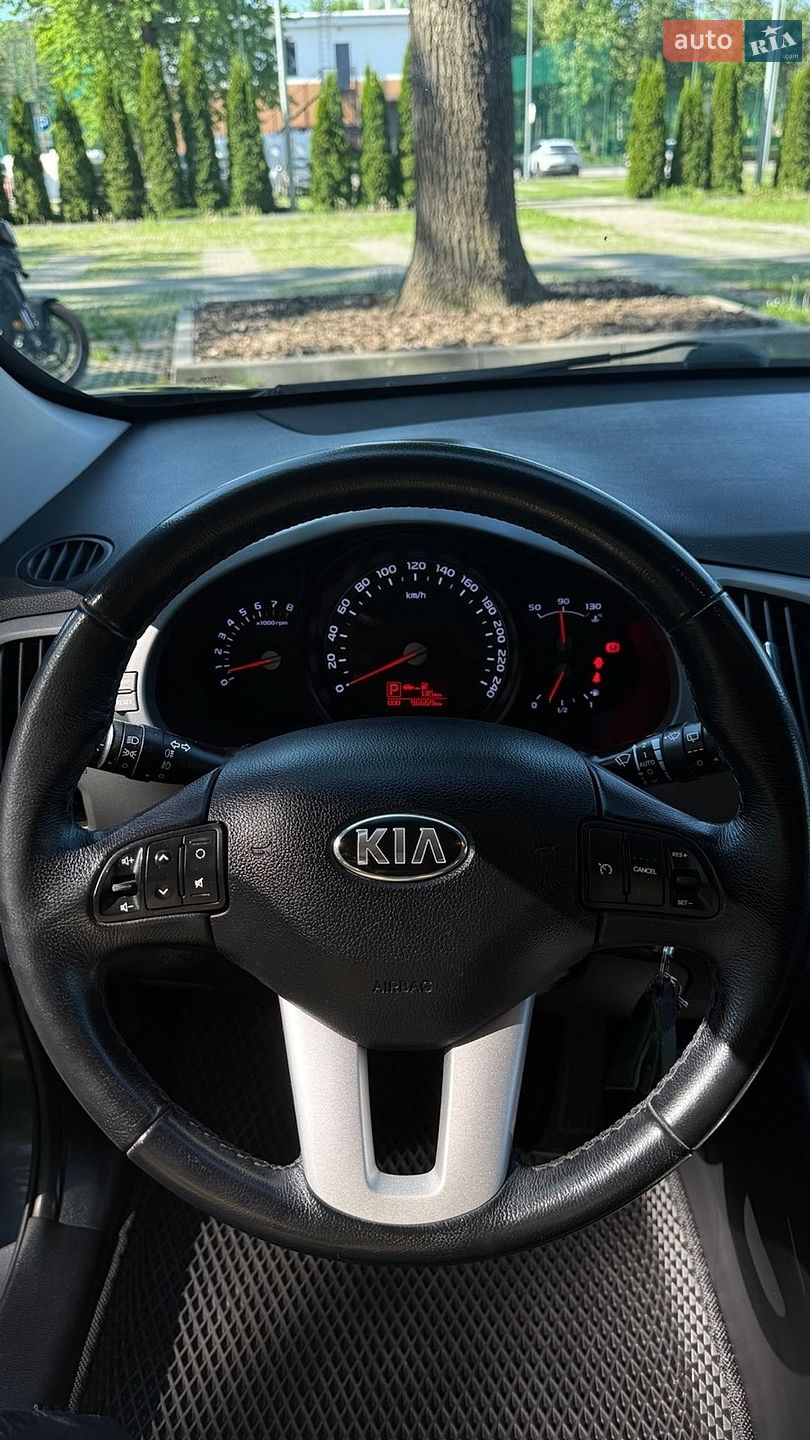 Kia Sportage 2015 VIN U5YPB81ABFL746915 фото оголошення 11 з 16