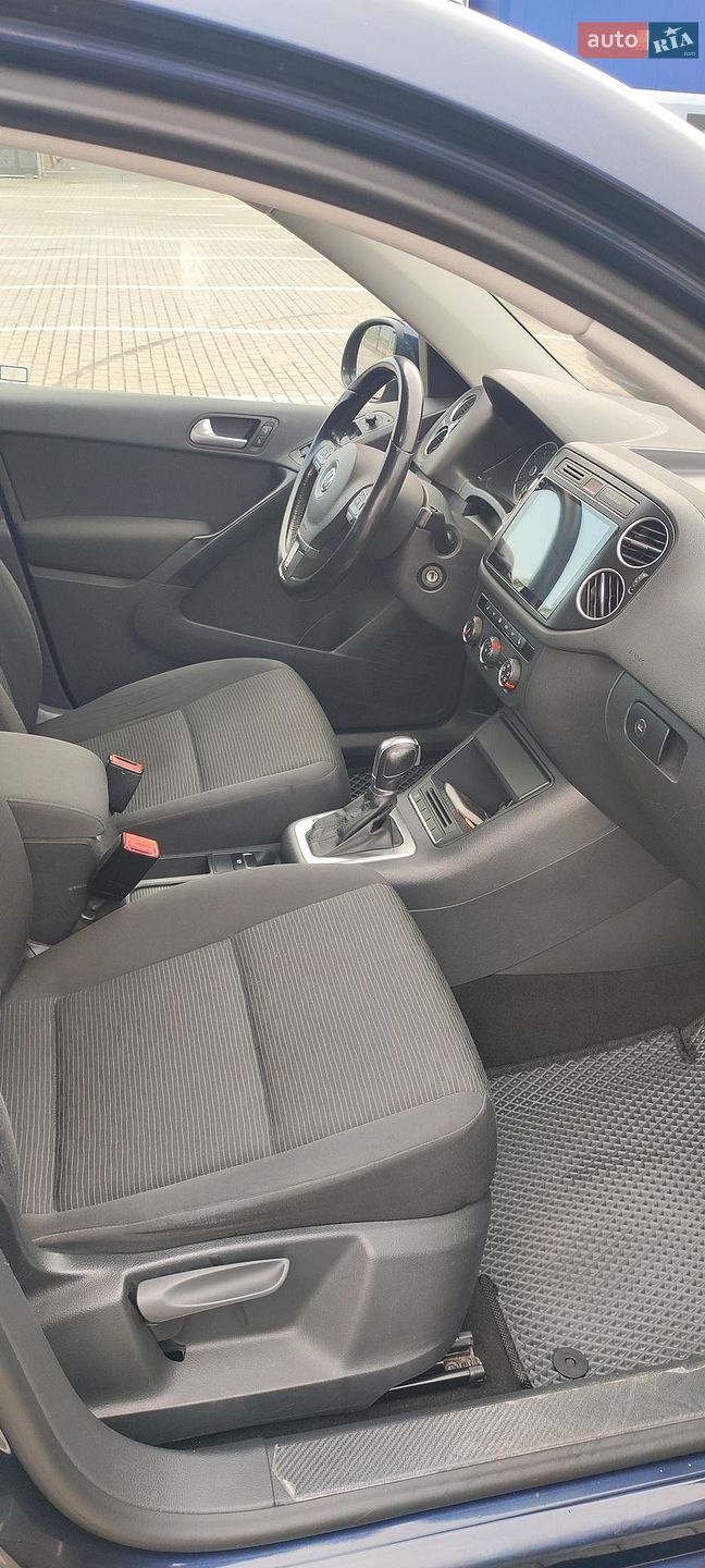 Volkswagen Tiguan 2014 VIN WVGJV7AX4FW550796 фото оголошення 7 з 18