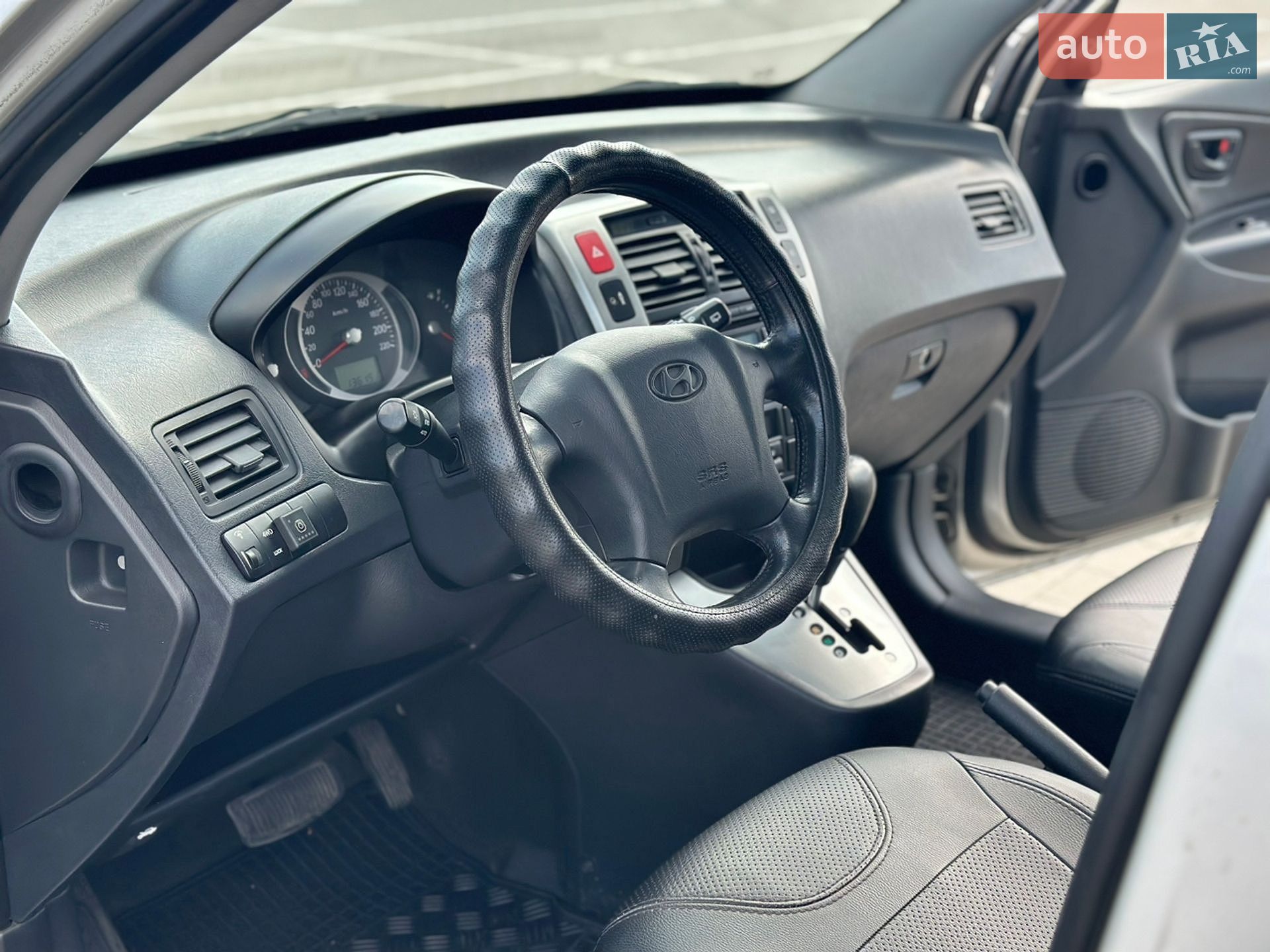 Hyundai Tucson 2008 VIN KMHJN81BP9U963100 фото оголошення 13 з 31