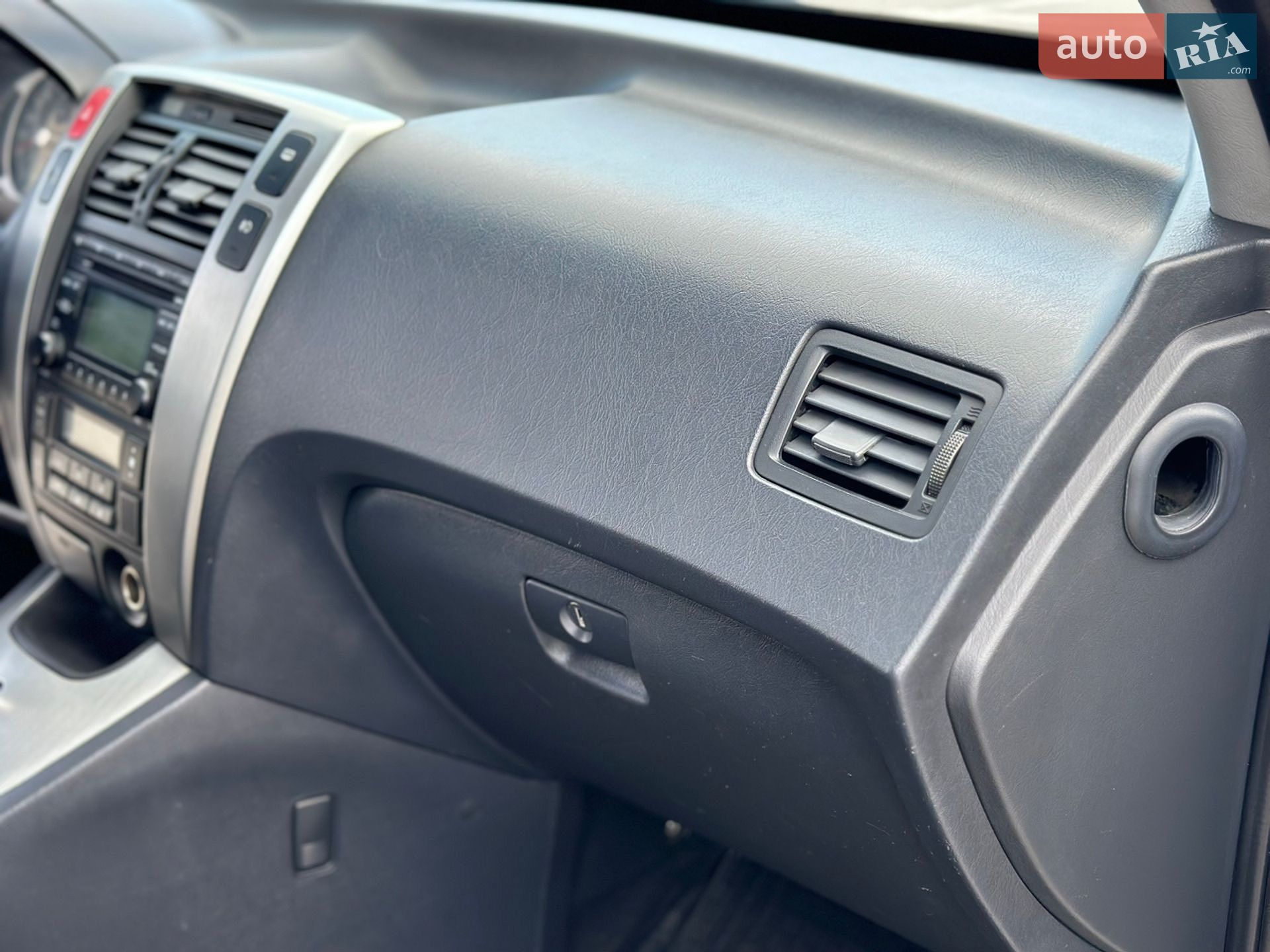 Hyundai Tucson 2008 VIN KMHJN81BP9U963100 фото оголошення 16 з 31