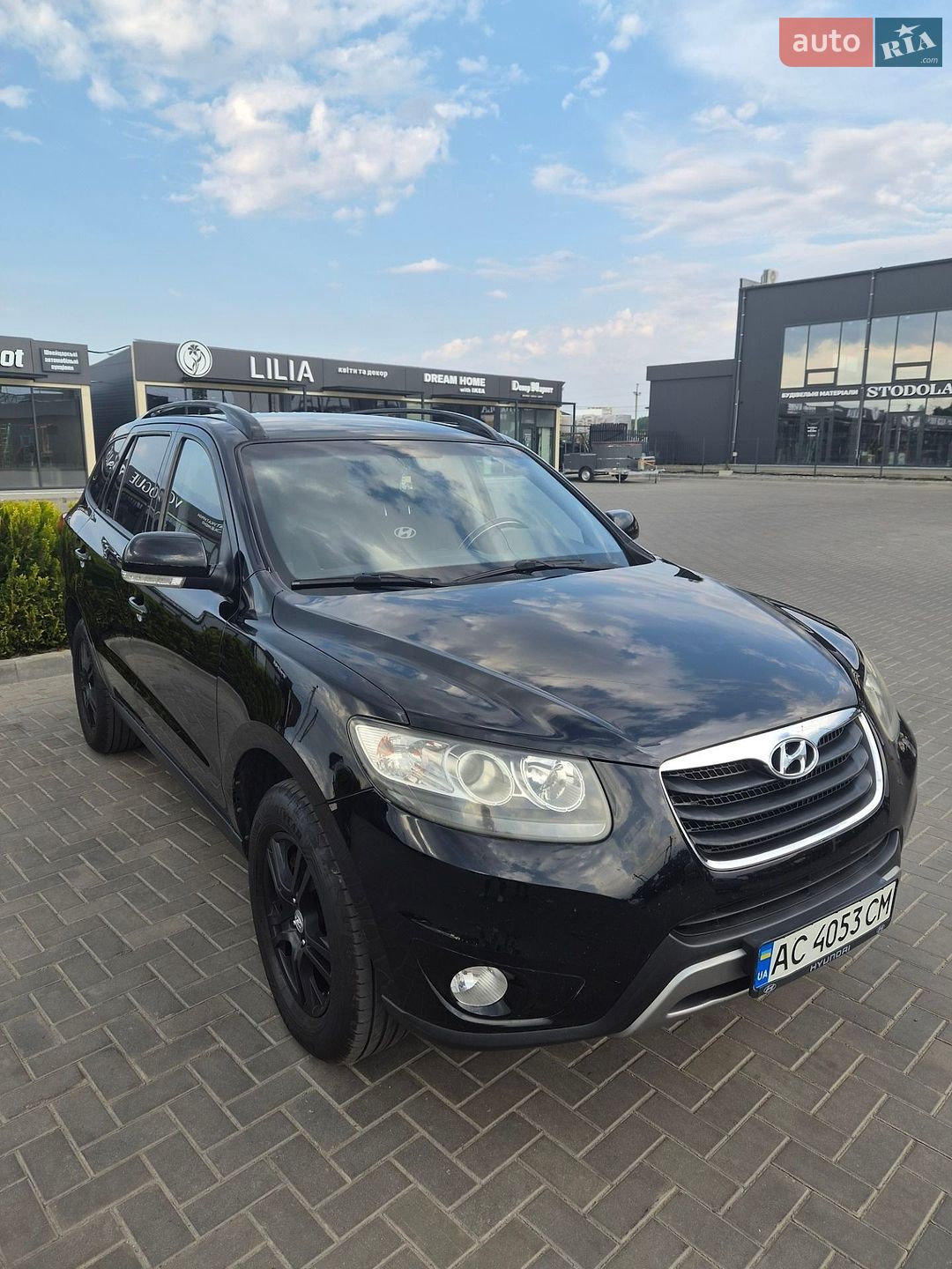 Hyundai Santa FE 2012 VIN KMHSH81XDCU879074 фото оголошення 2 з 11