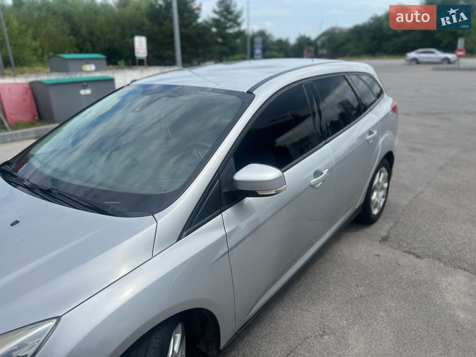 Ford Focus 2013 VIN WF0LXXGCBLDE27578 фото оголошення 14 з 35