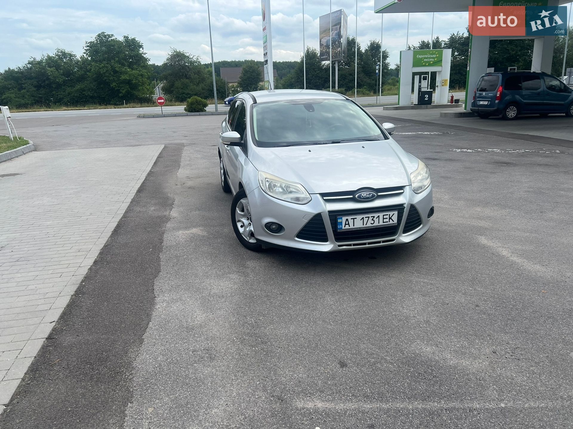 Ford Focus 2013 VIN WF0LXXGCBLDE27578 фото оголошення 12 з 35