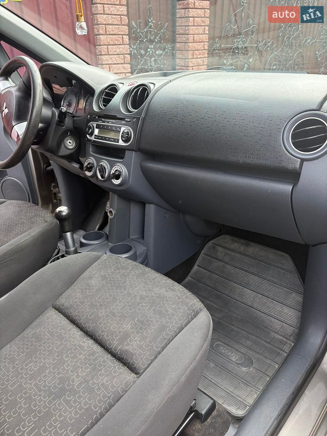 Mitsubishi Colt 2010 VIN XMCXNZ33A9F069813 фото оголошення 7 з 8