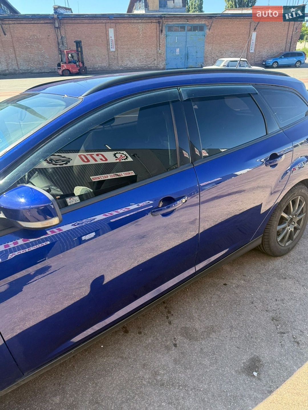 Ford Focus 2013 VIN WF0LXXGCBLDC59438 фото оголошення 4 з 11