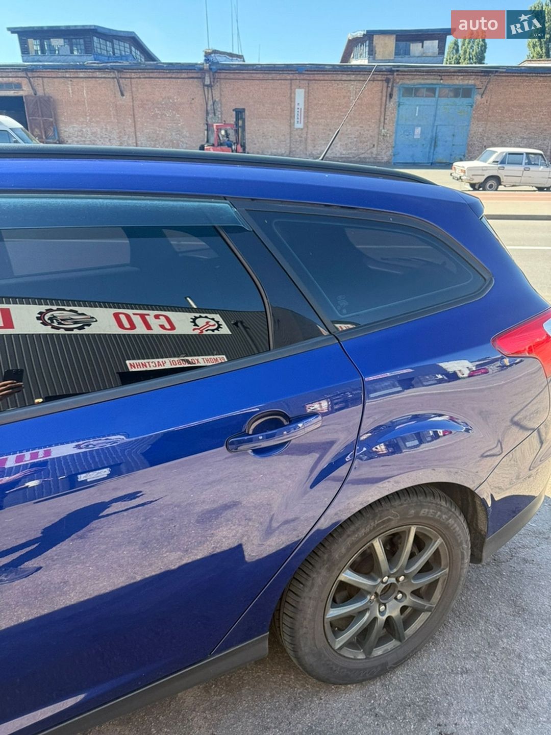Ford Focus 2013 VIN WF0LXXGCBLDC59438 фото оголошення 5 з 11