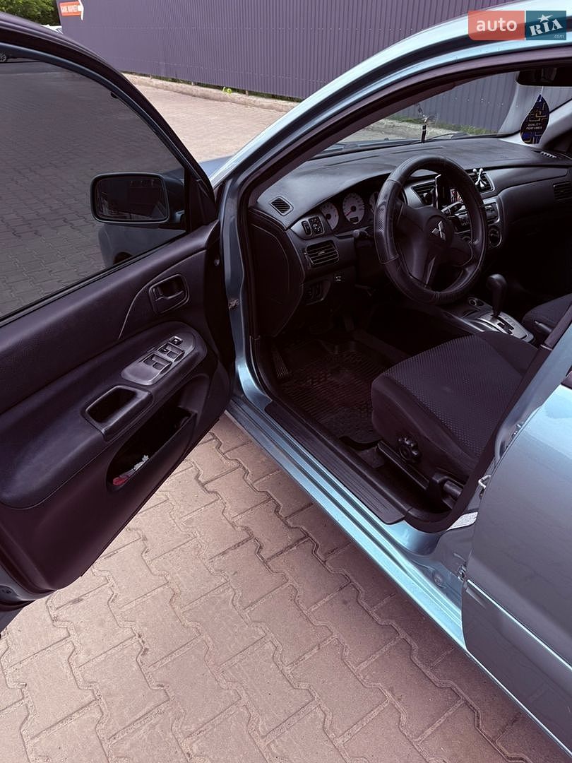 Mitsubishi Lancer 2008 VIN JMBSRCS3A8U007262 фото оголошення 12 з 21